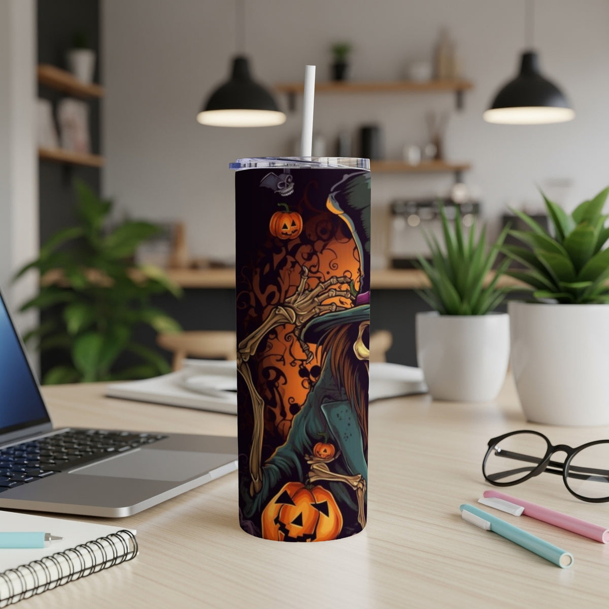 Halloween tumbler featuring a skeleton witch with pumpkins and bats.
