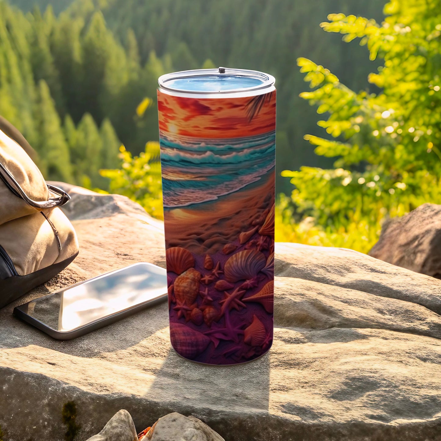 Tumbler with beach and seashell design on a rock.