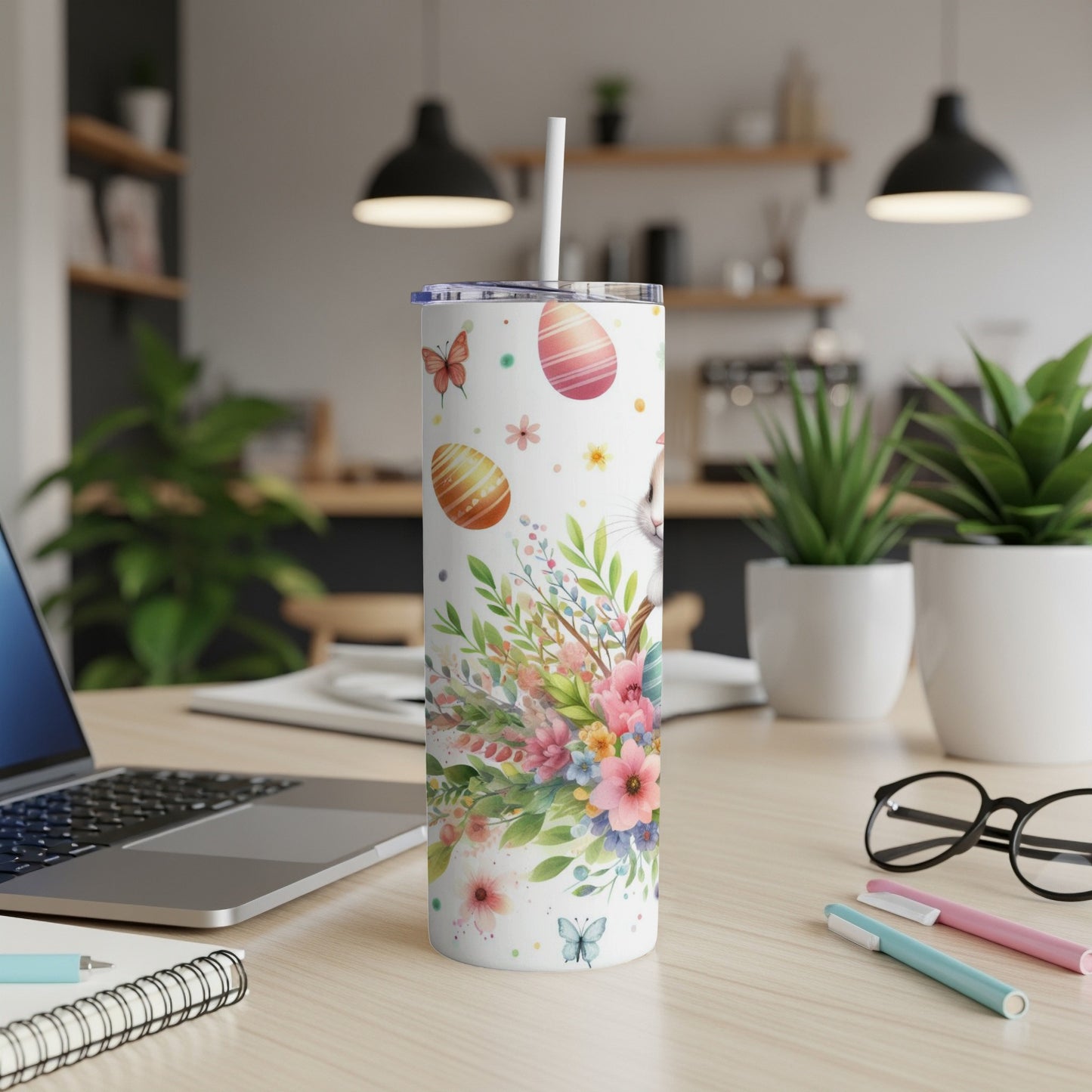 Easter bunny and floral pattern on a white tumbler with straw.