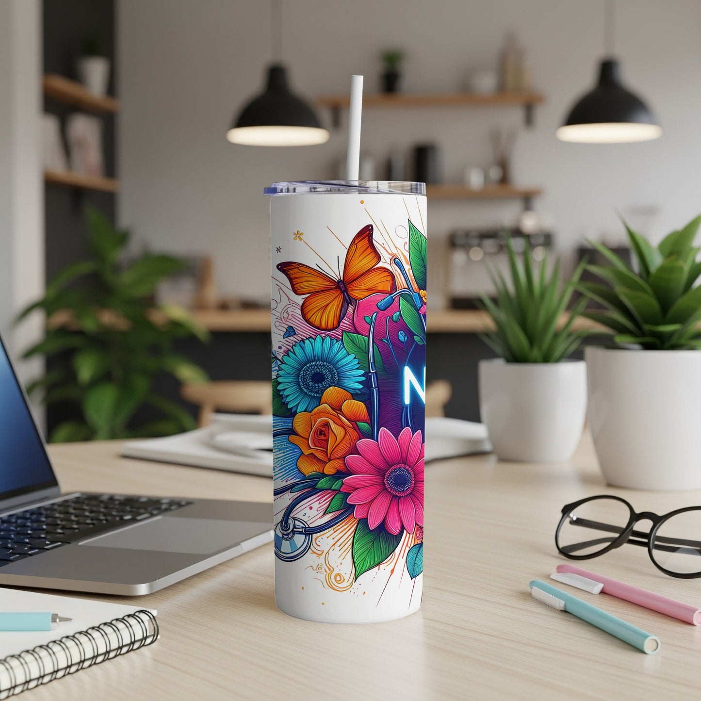 White tumbler with colorful floral and butterfly design, features "RN" neon light graphic.