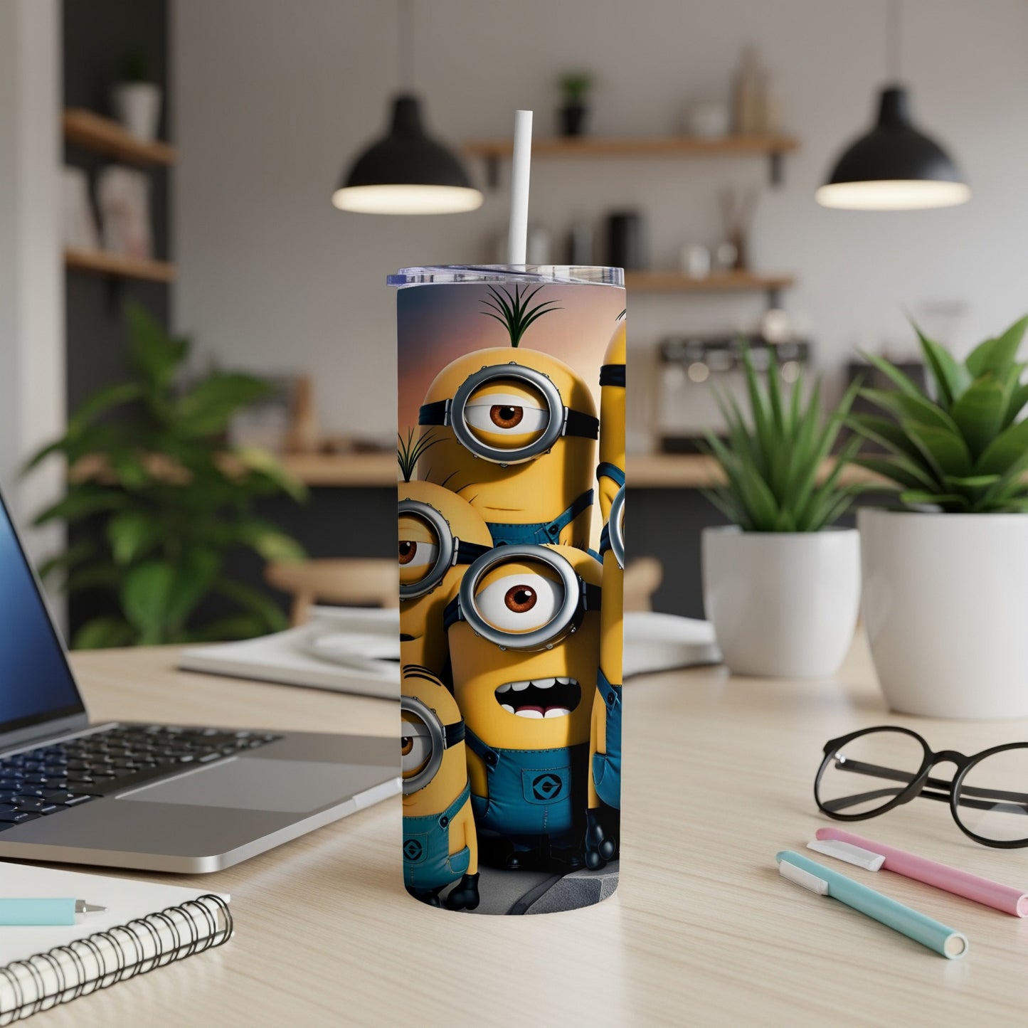 Minions cartoon characters on a white tumbler with a straw.