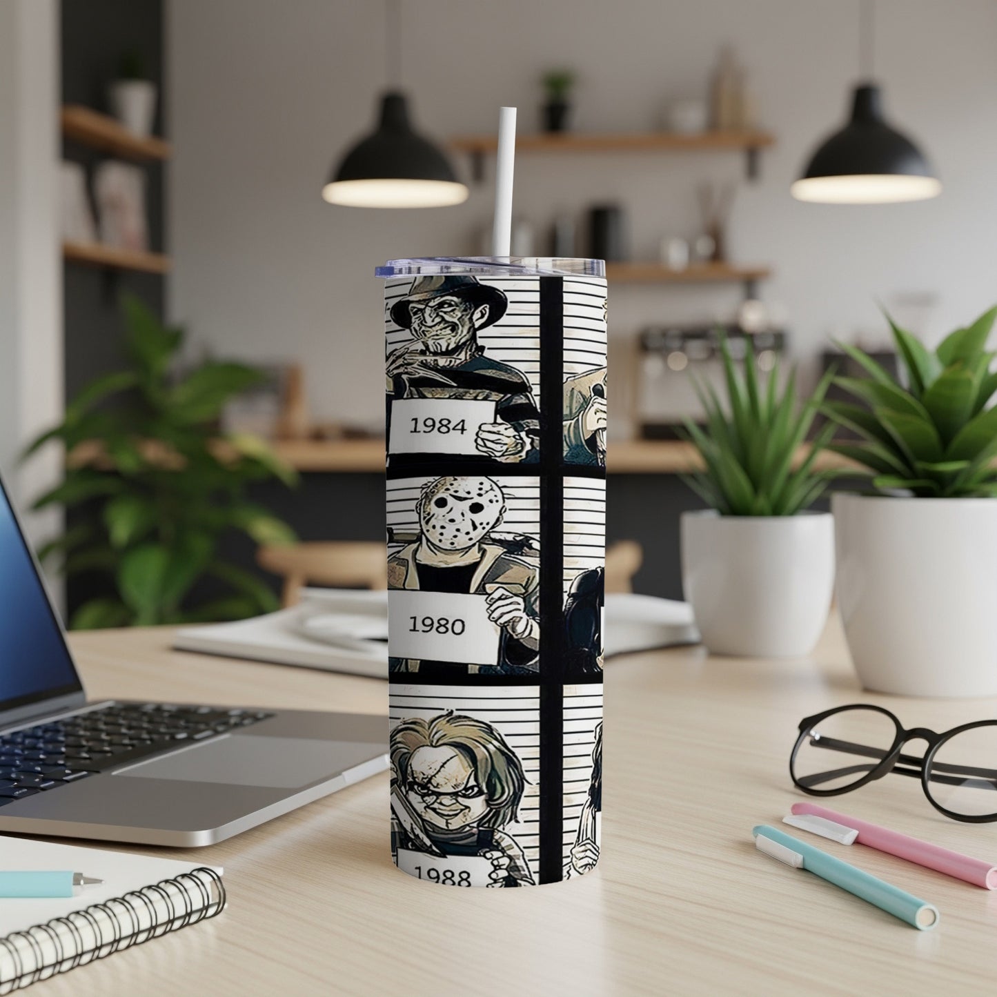 Mugshot-style tumbler with horror villains, including Freddy Krueger, Jason Voorhees, and Chucky.