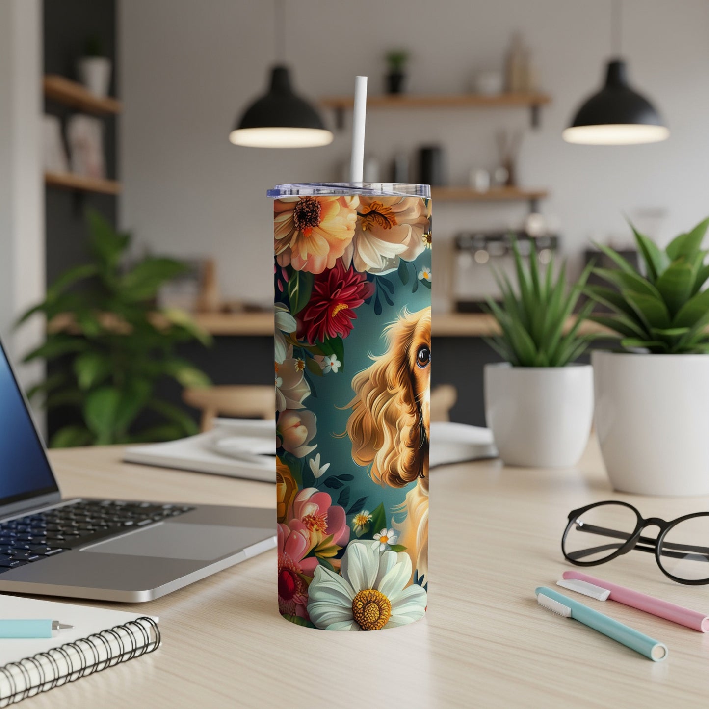 Golden retriever with floral pattern on a tall tumbler with a straw.