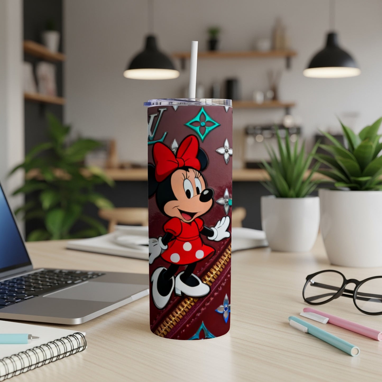 Minnie Mouse on a maroon tumbler with Louis Vuitton-inspired pattern and white straw.