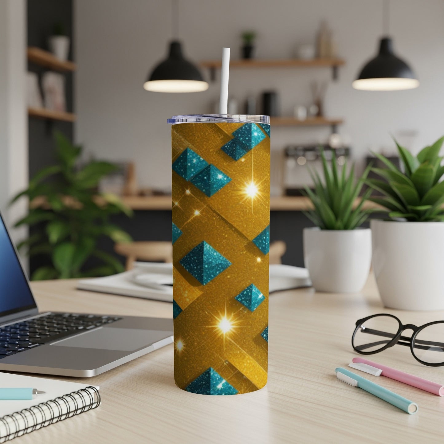 Gold tumbler with turquoise pyramid pattern and sparkle accents.