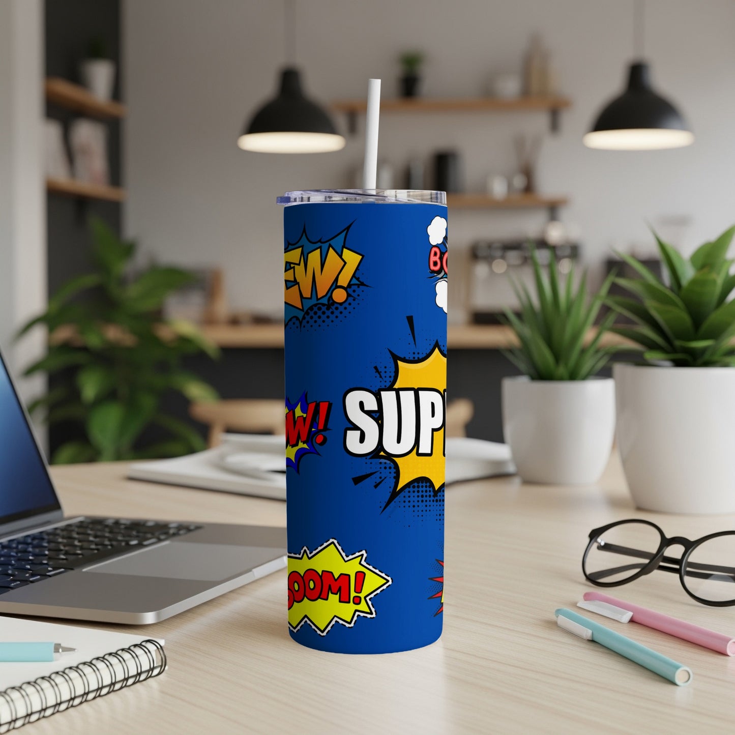 Blue tumbler with comic book style sound effects and "SUP!" text.