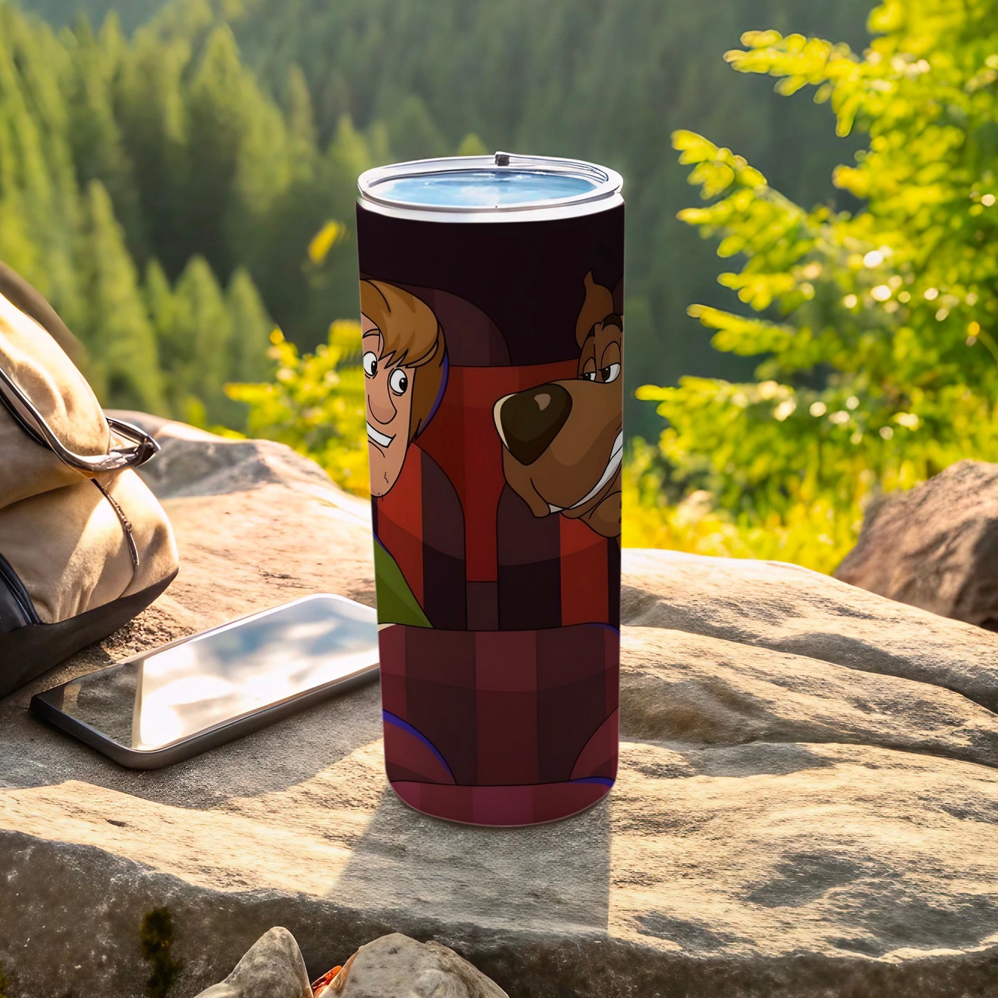 Scooby-Doo and Shaggy in the Mystery Machine tumbler on a rock.