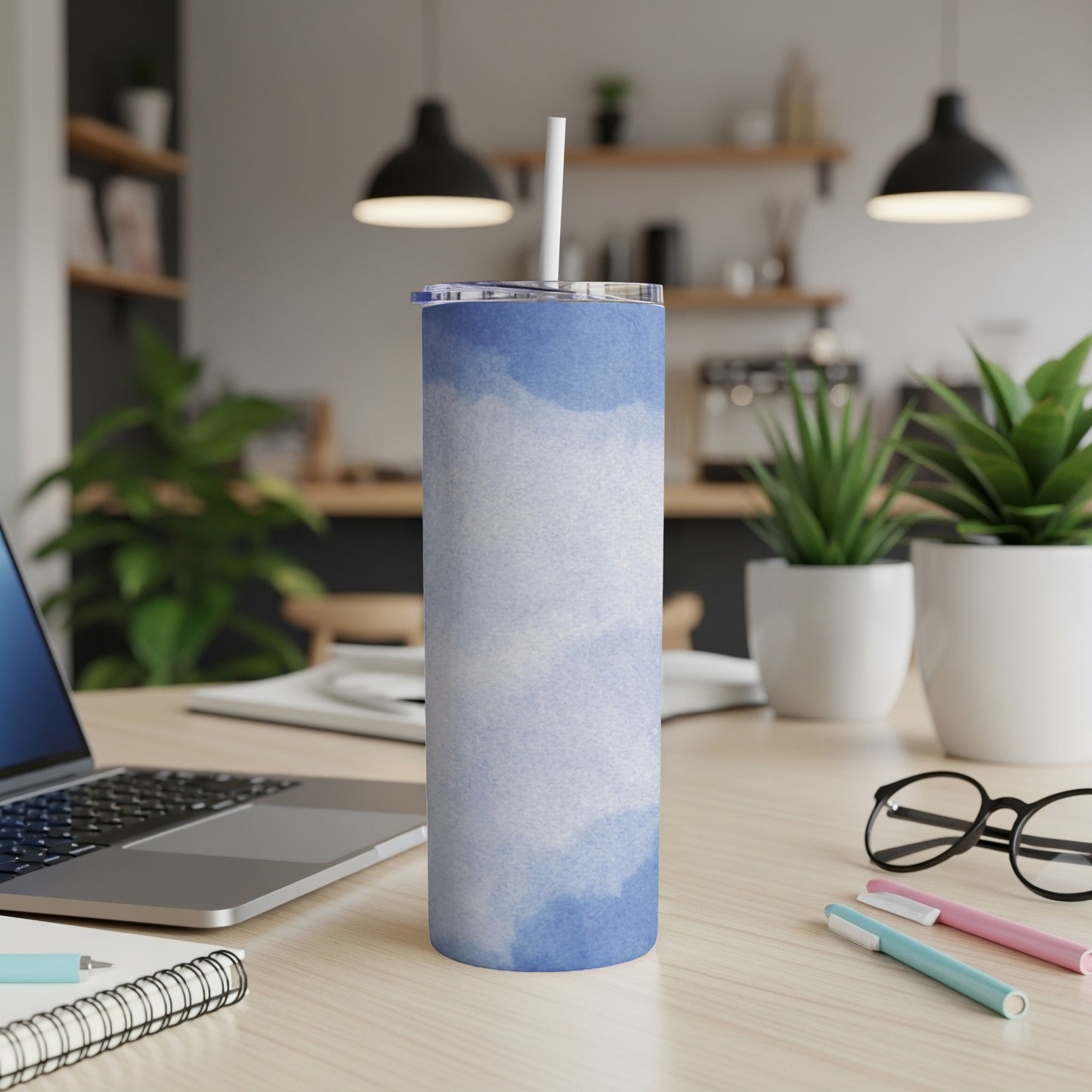 Blue watercolor abstract print stainless steel skinny tumbler with straw.
