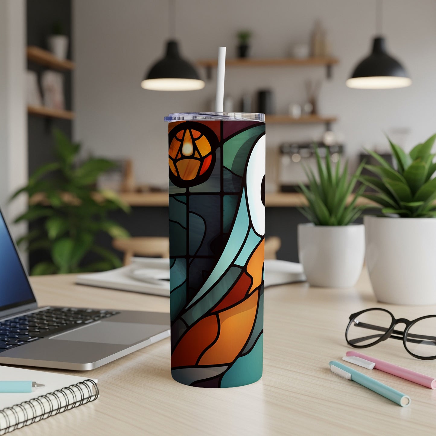 Stained glass owl design on a white tumbler with a straw.