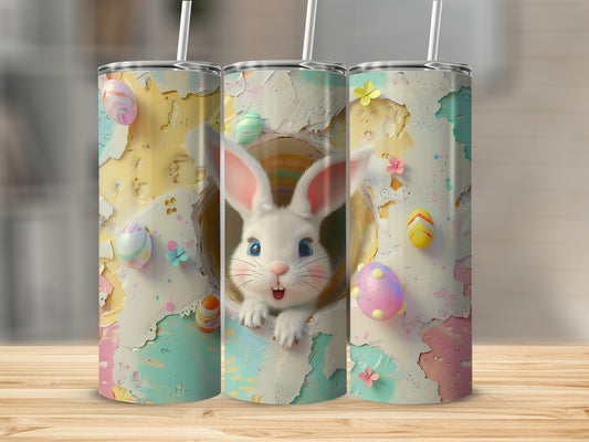 Easter bunny peeking from cracked egg design on three tumblers.