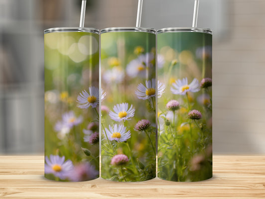 Three tumblers featuring a field of white daisies and pink wildflowers.