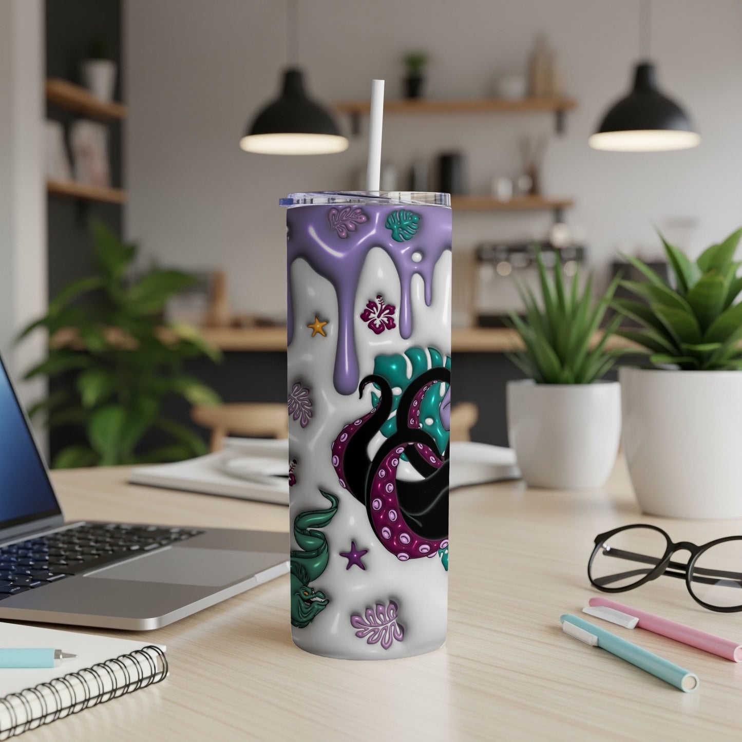 Purple and green tentacles and mythical creatures wrap around a white tumbler.