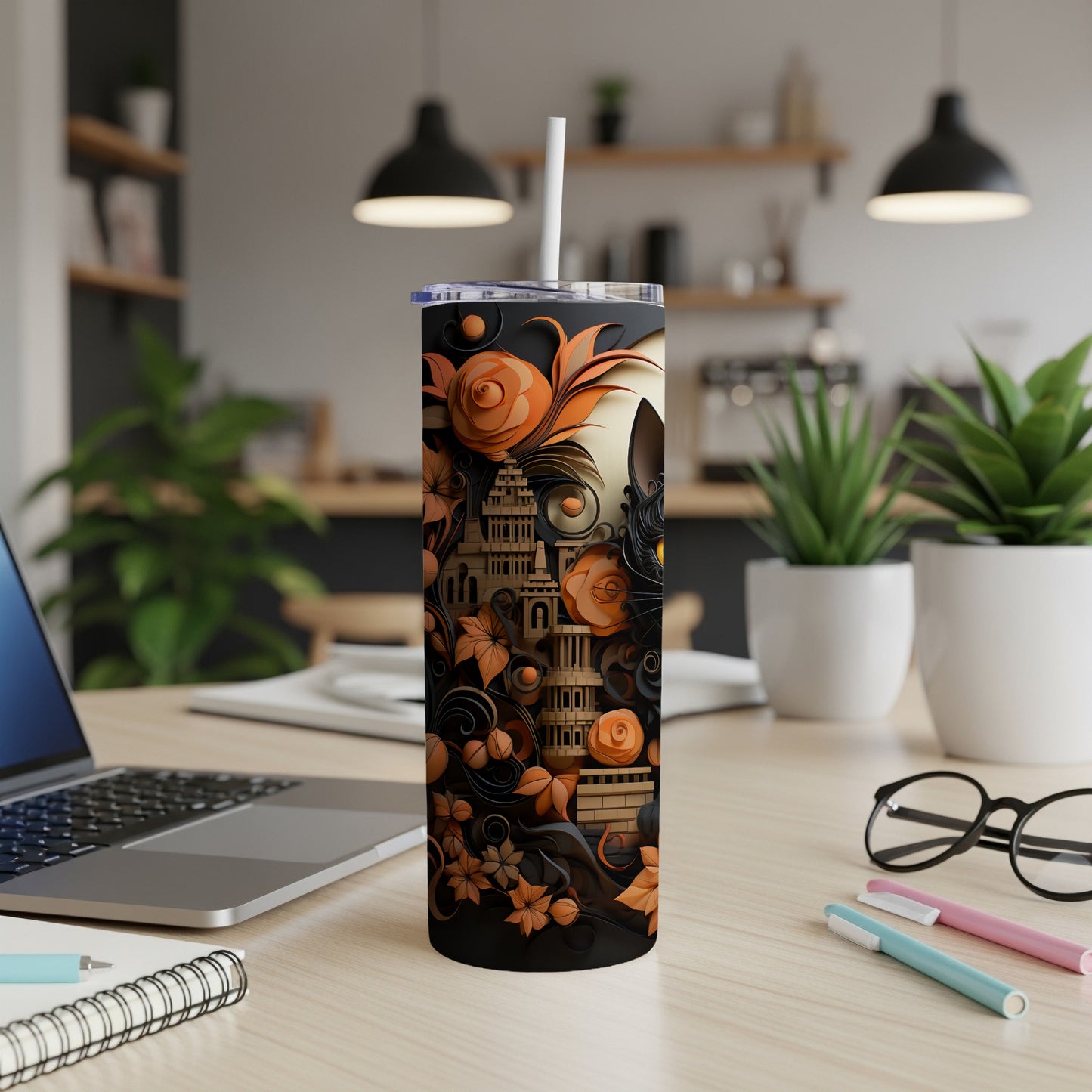 Black tumbler with ornate orange floral and pagoda design.