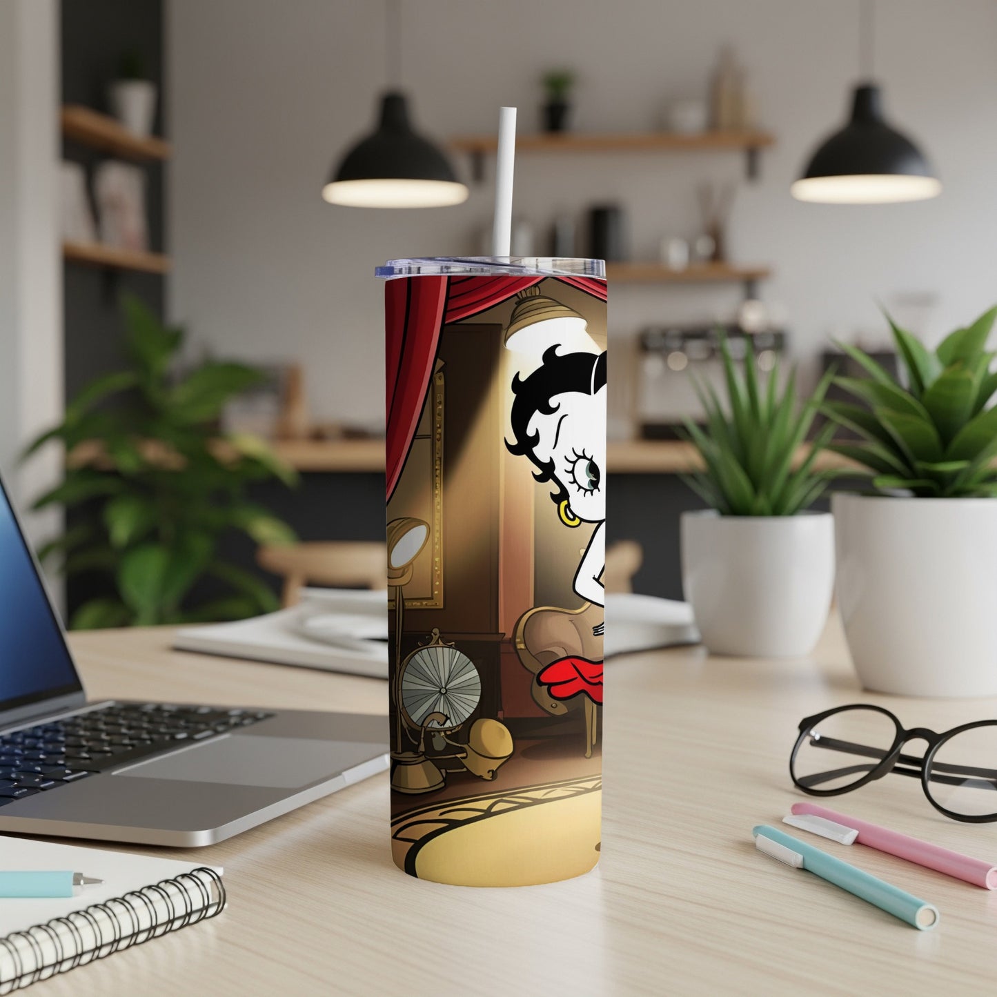 Betty Boop ceramic tumbler with a stage backdrop and a vintage fan.