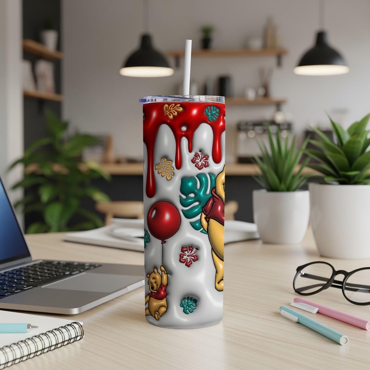 Winnie the Pooh tumbler with red drips, balloons, and white accents.