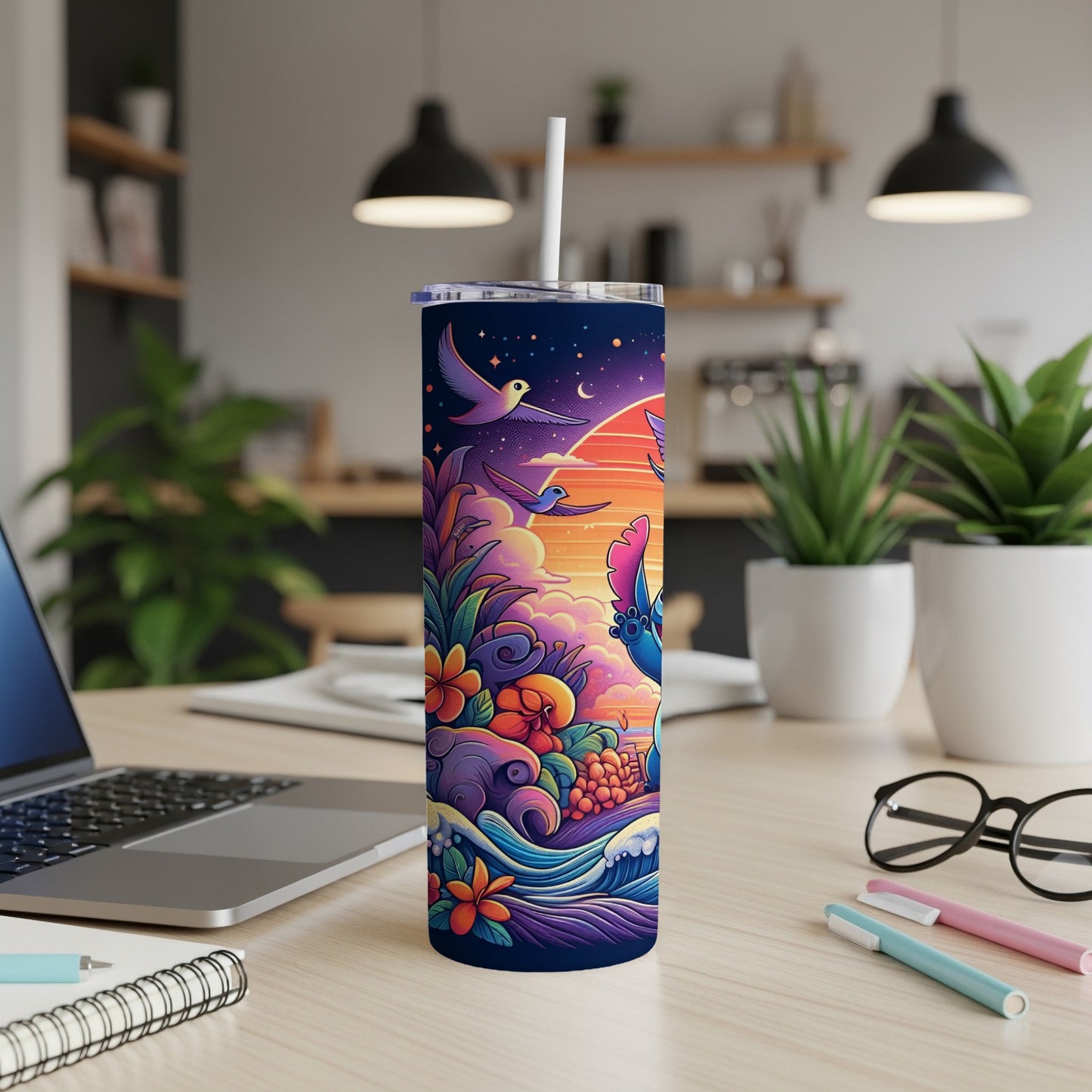Tropical birds and vibrant flowers on a tumbler with a straw.