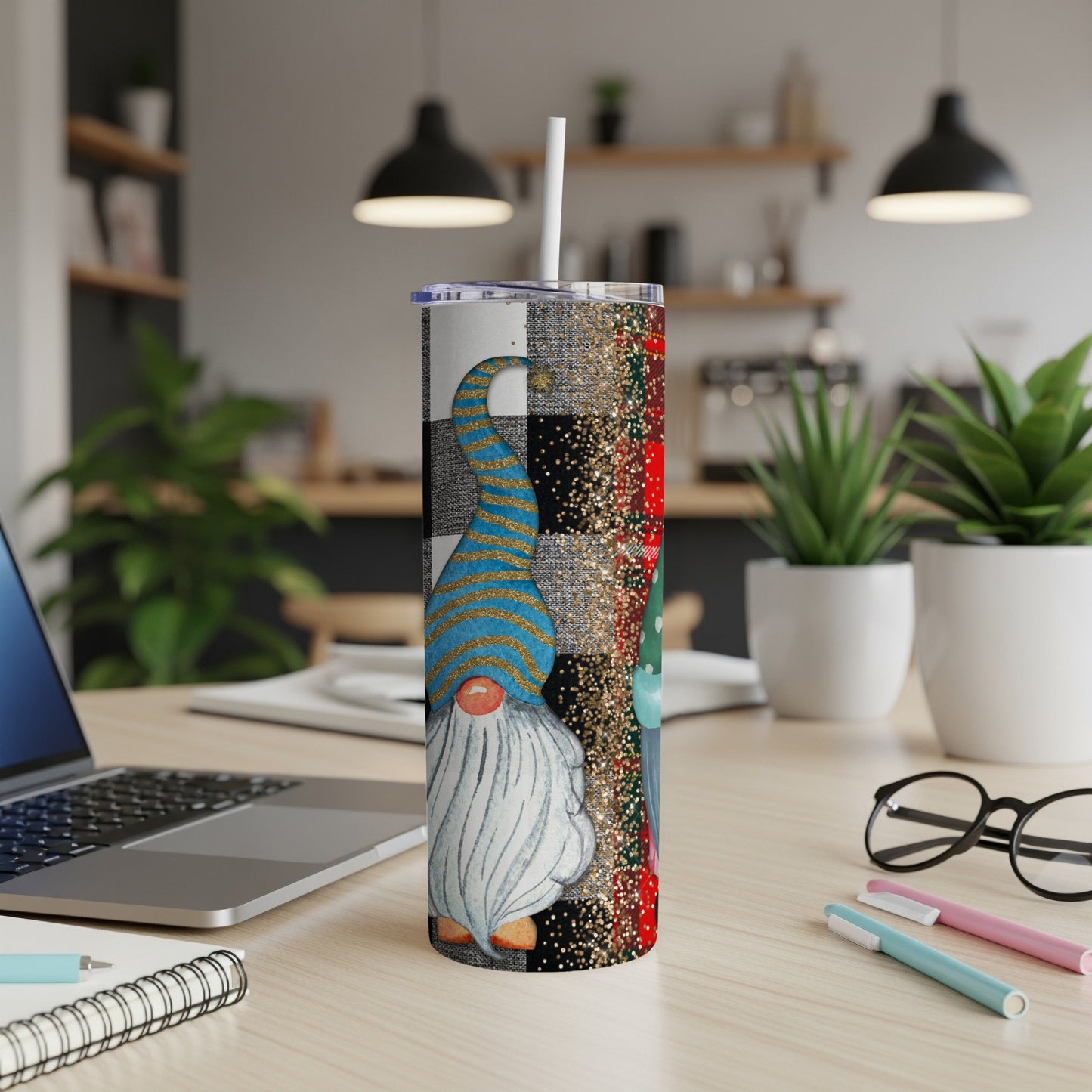 Christmas gnome tumbler with blue and gold hat and buffalo plaid pattern.