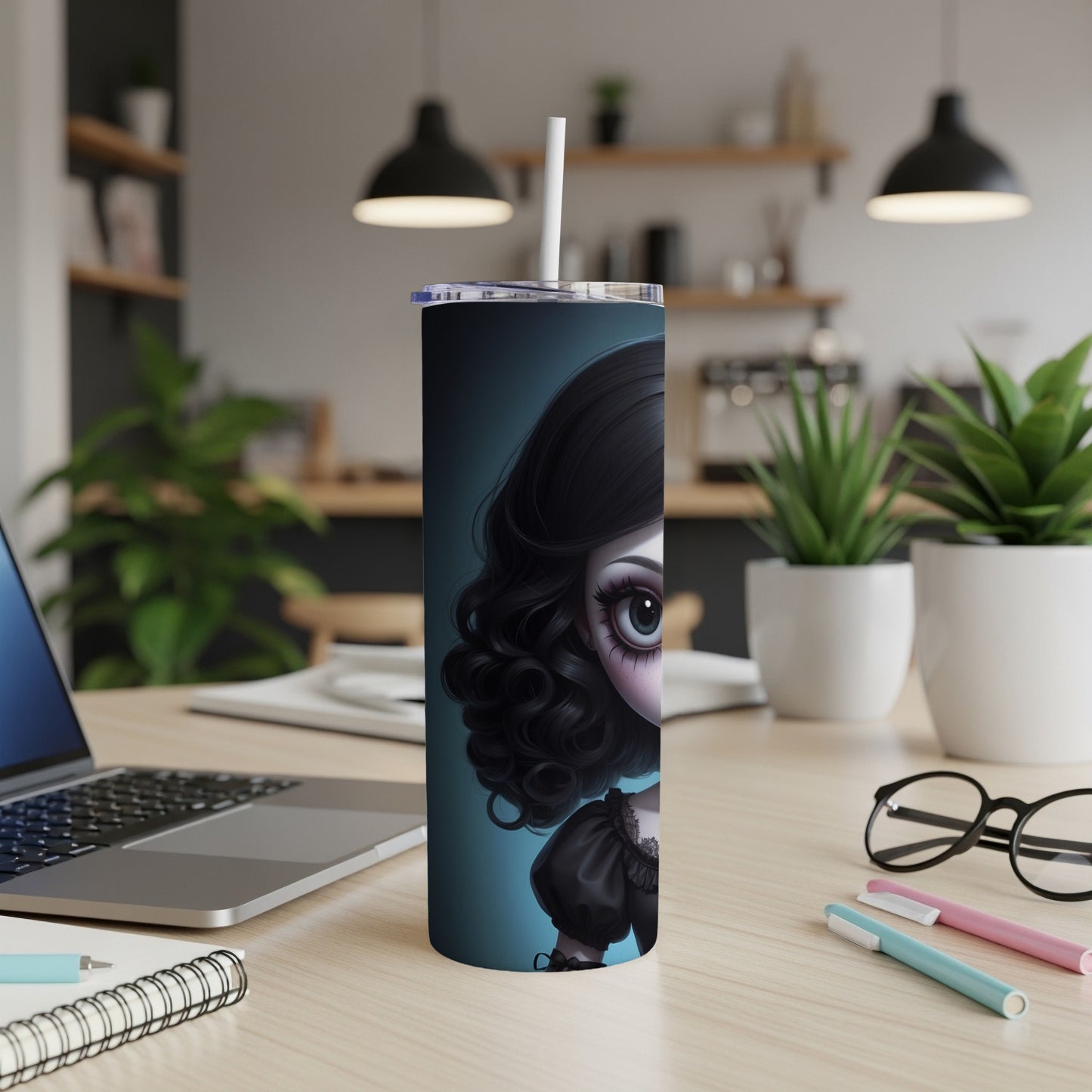 Gothic doll illustration on a blue background on a tall, slender tumbler.