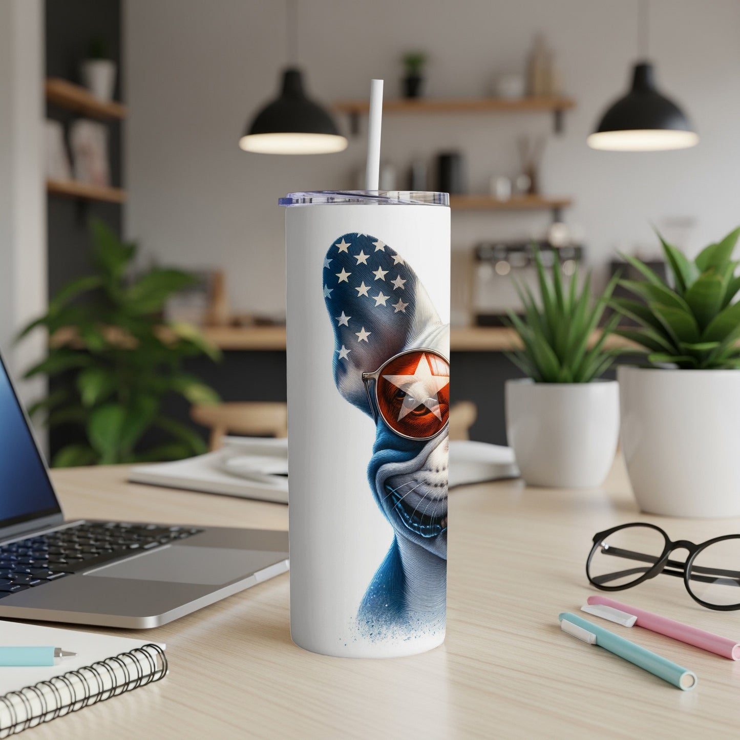 White tumbler with a bulldog wearing sunglasses and a star design.