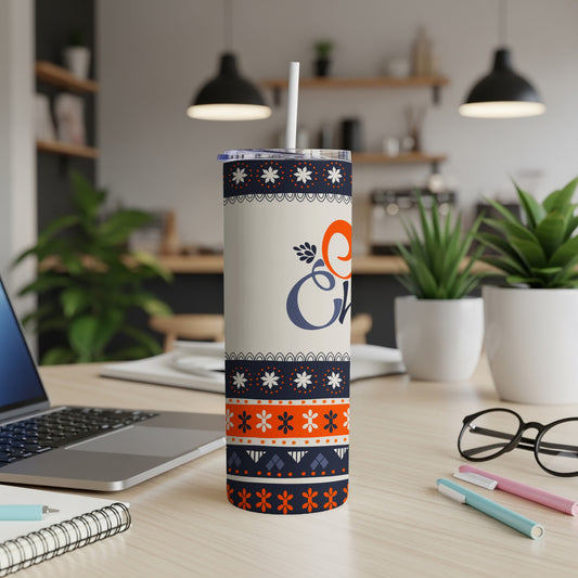 White tumbler with orange and blue "Cheer" text and snowflake design.