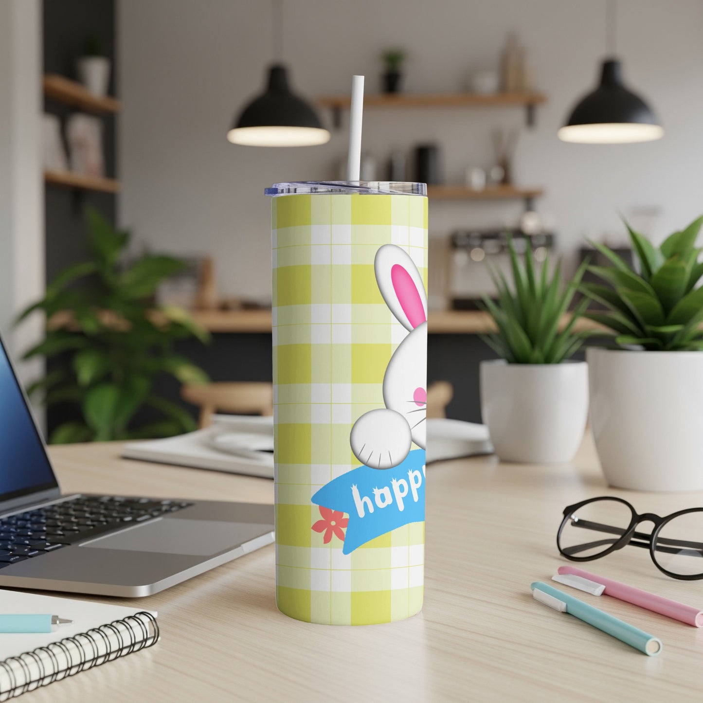 Yellow checkered tumbler with a white bunny holding a "happy" banner.