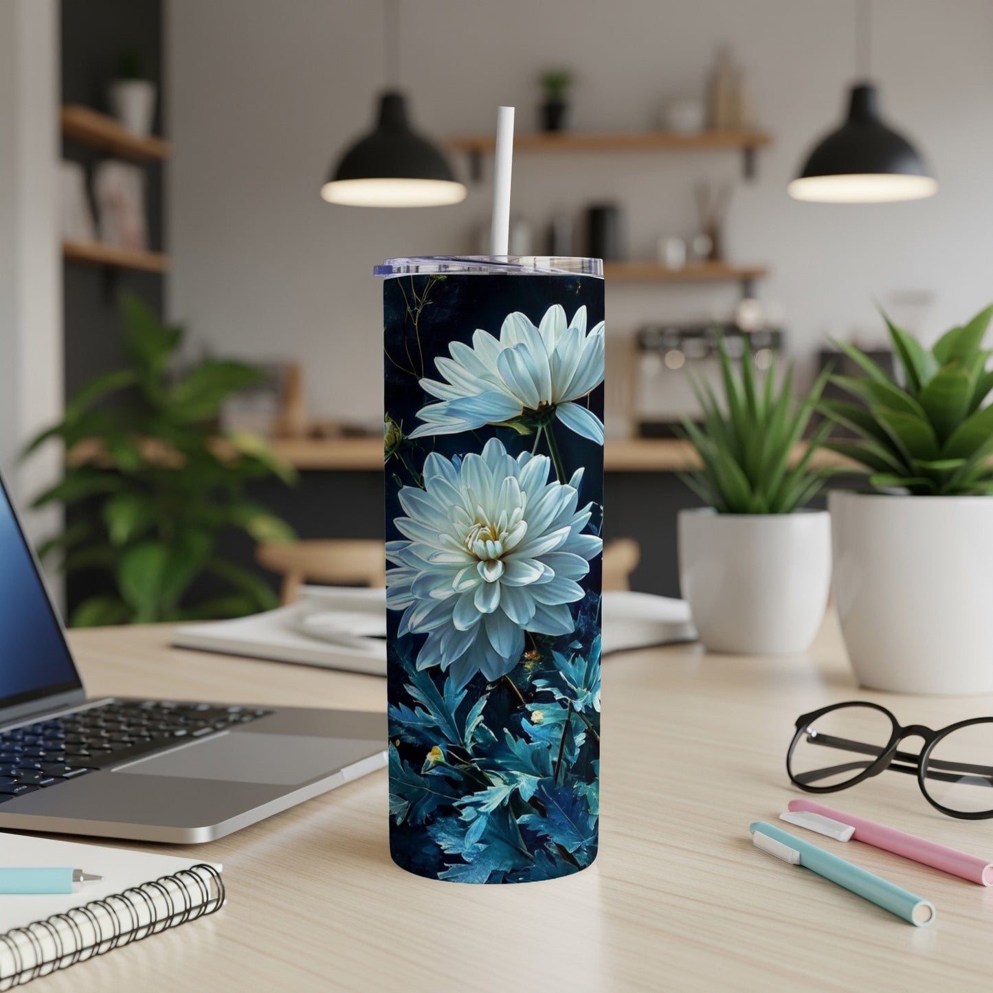 White dahlias on a dark blue background, depicted on a stainless steel tumbler.