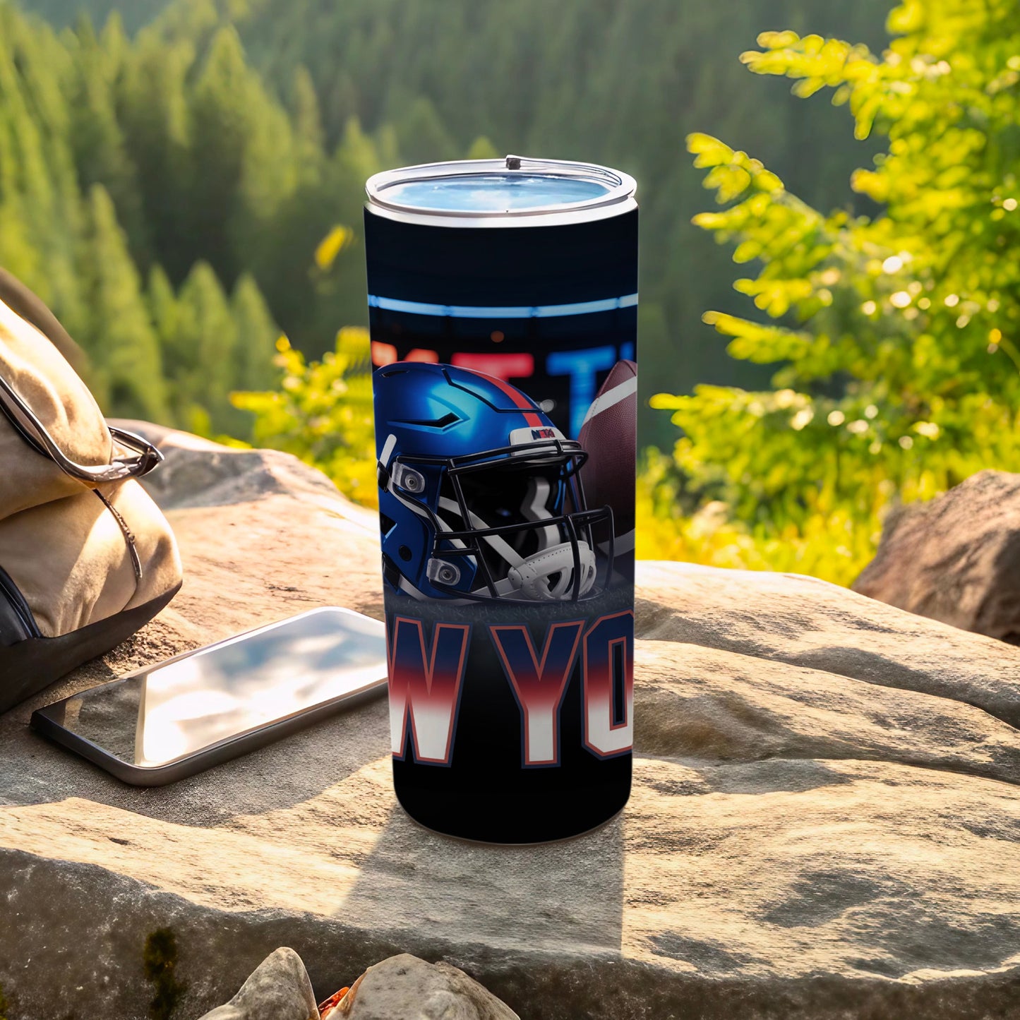 New York Giants football helmet and ball on a tumbler.