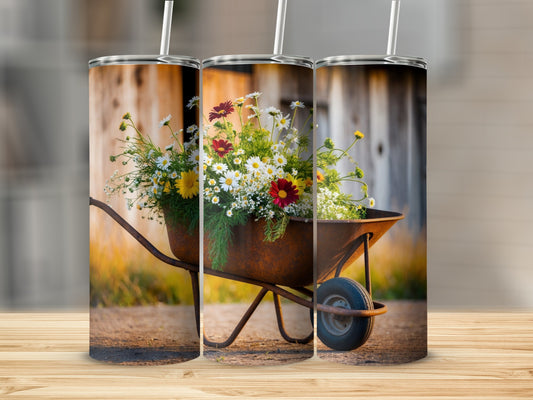 Rusty wheelbarrow filled with colorful daisies and wildflowers.