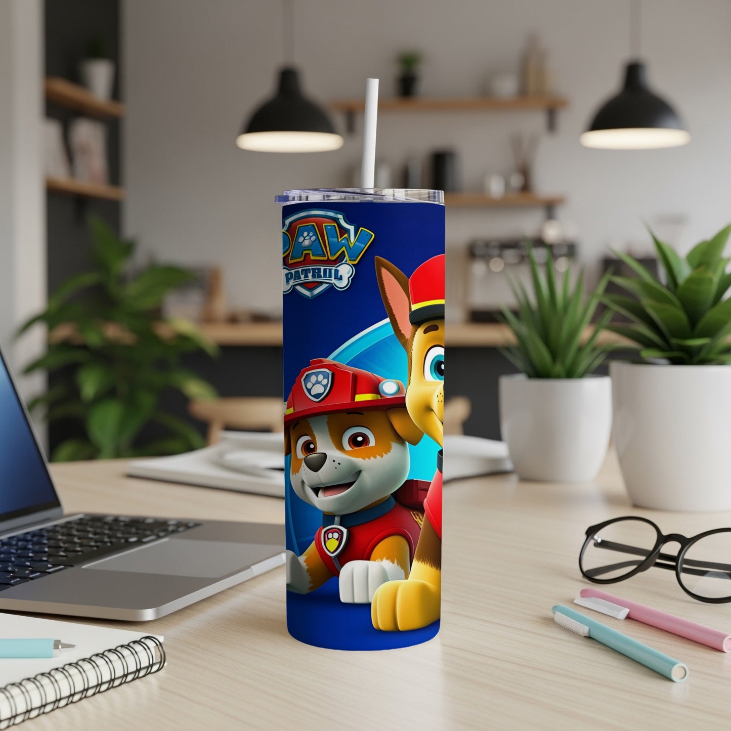Chase and Marshall from Paw Patrol on a blue tumbler with a straw.