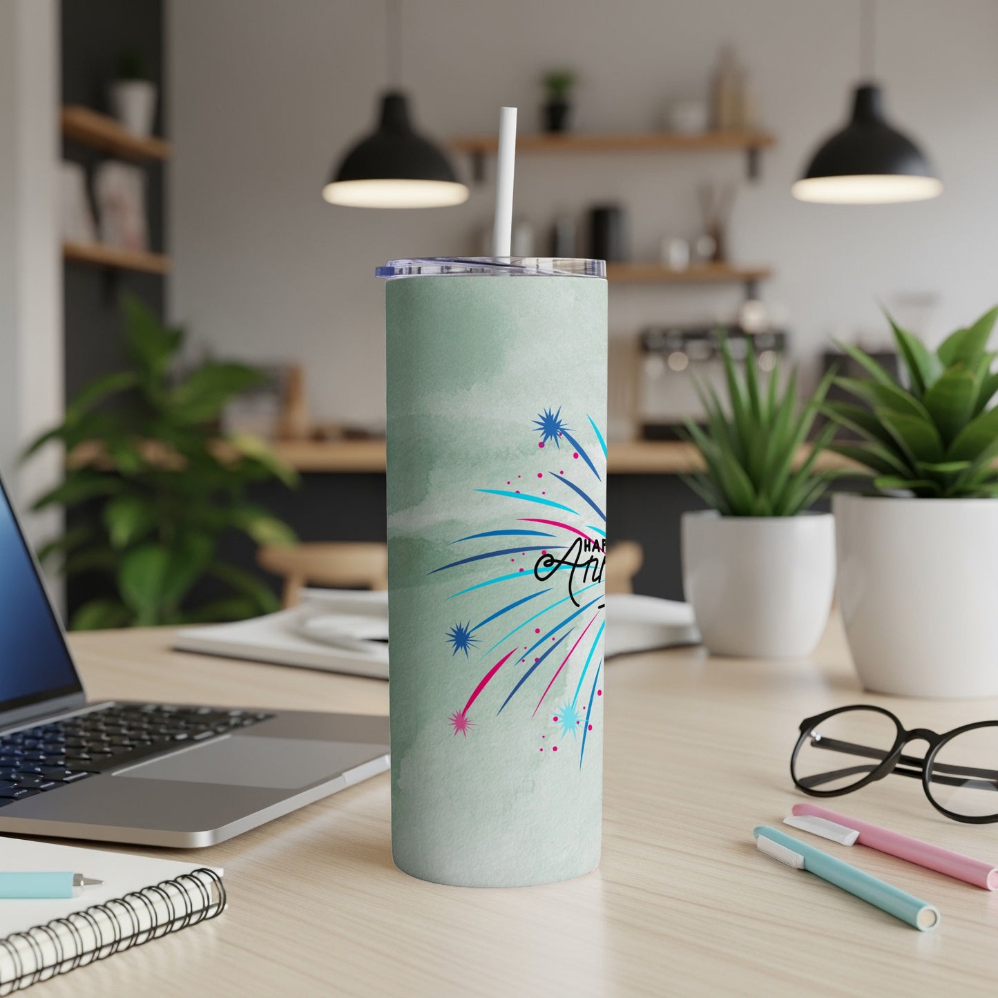 Mint green tumbler with fireworks design and "Happy Anniversary" text.