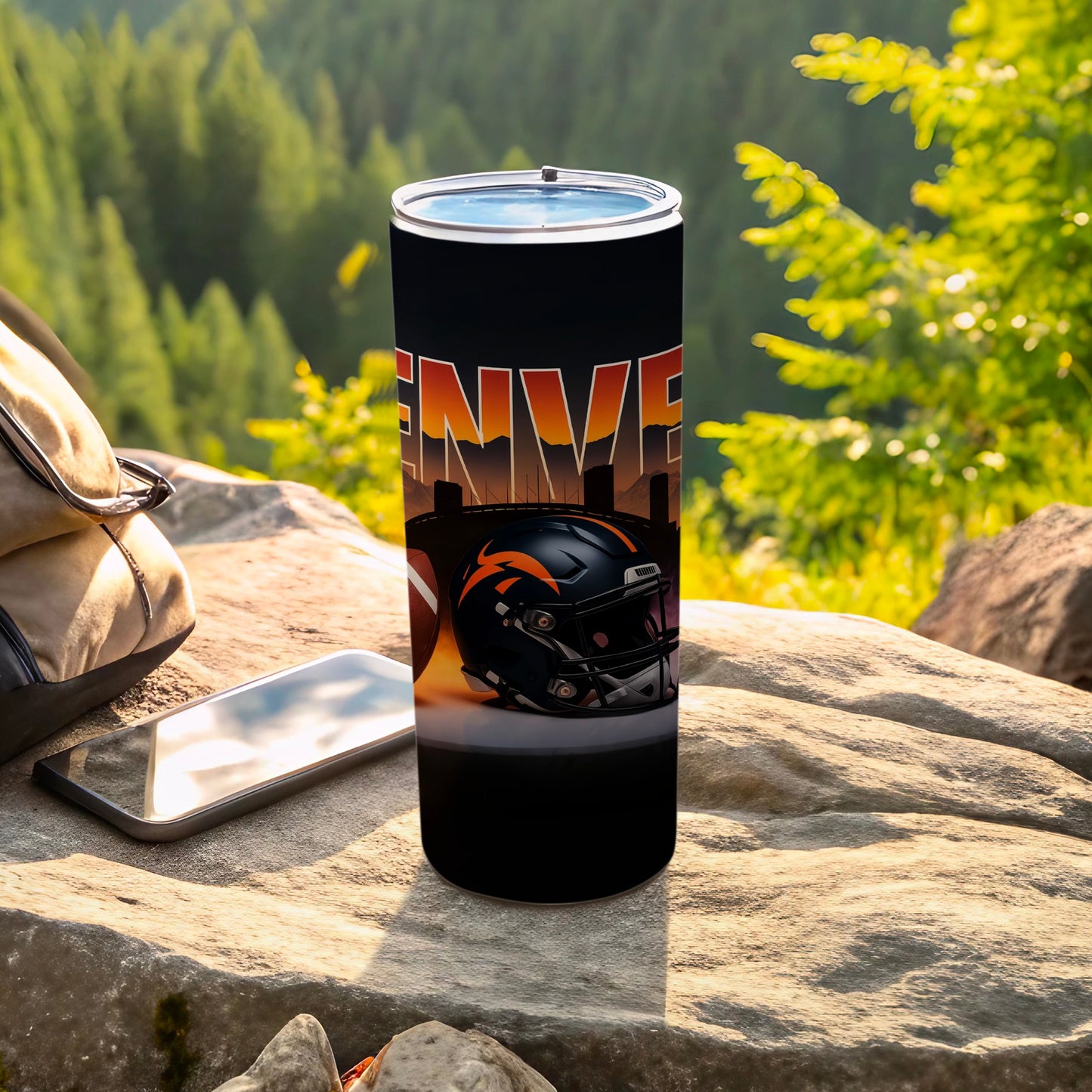 Denver Broncos helmet and city skyline on a tumbler.
