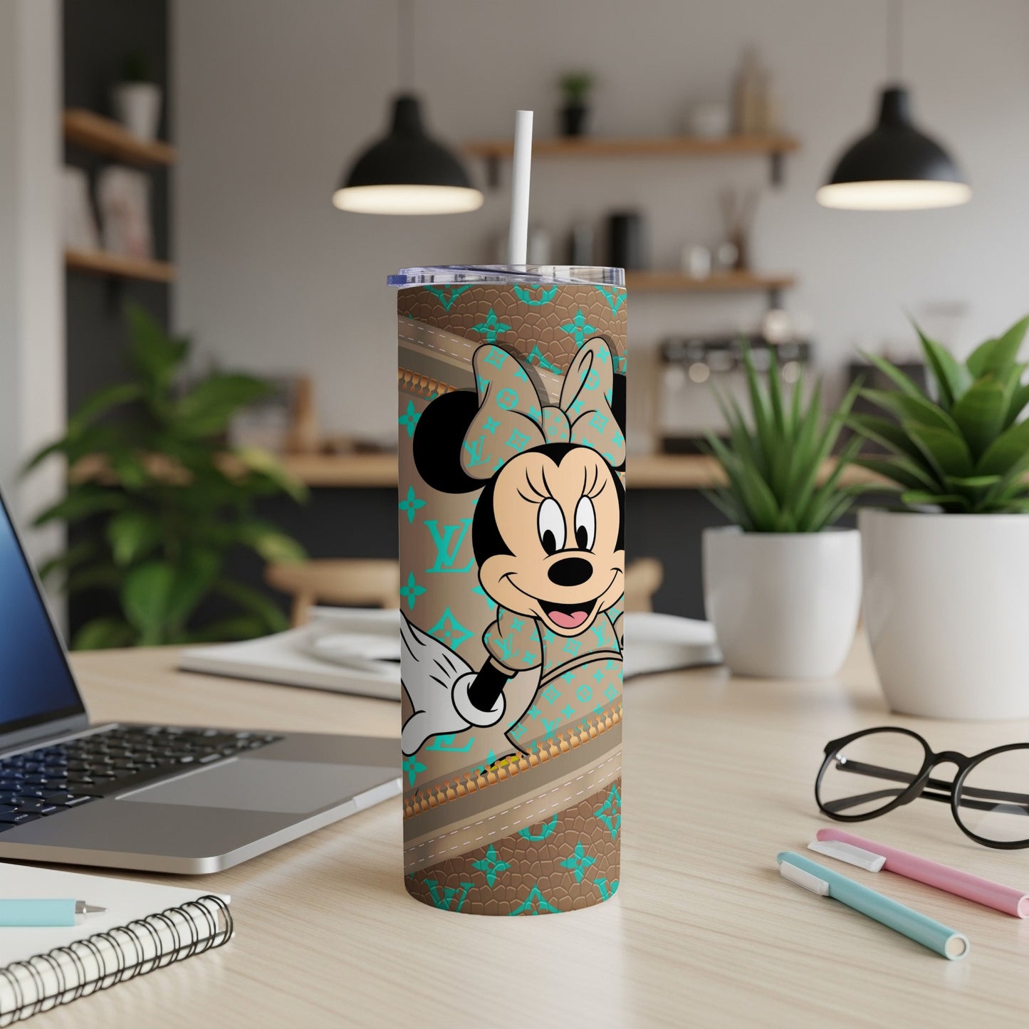 Minnie Mouse on a brown tumbler with repeating LV-style pattern and straw.