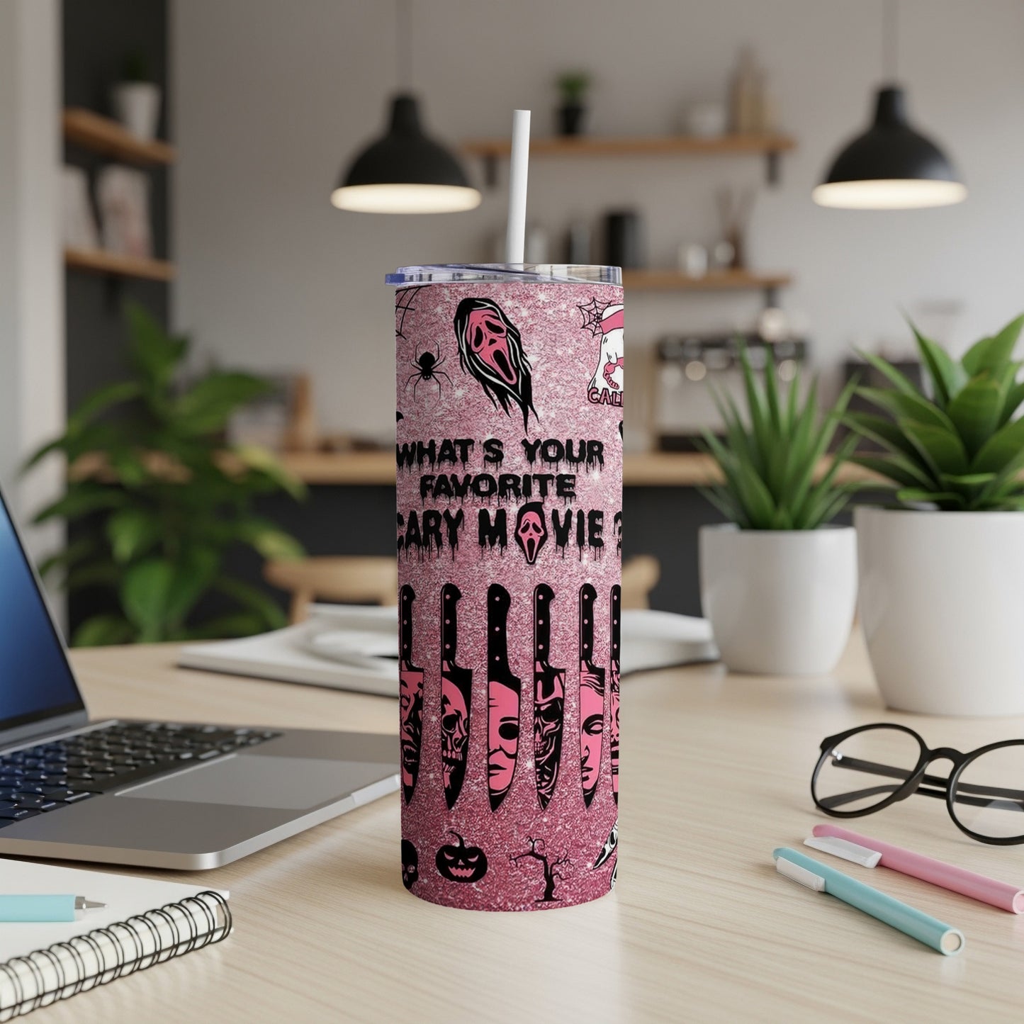 Pink glitter tumbler with knives and "What's Your Favorite Scary Movie?" text.