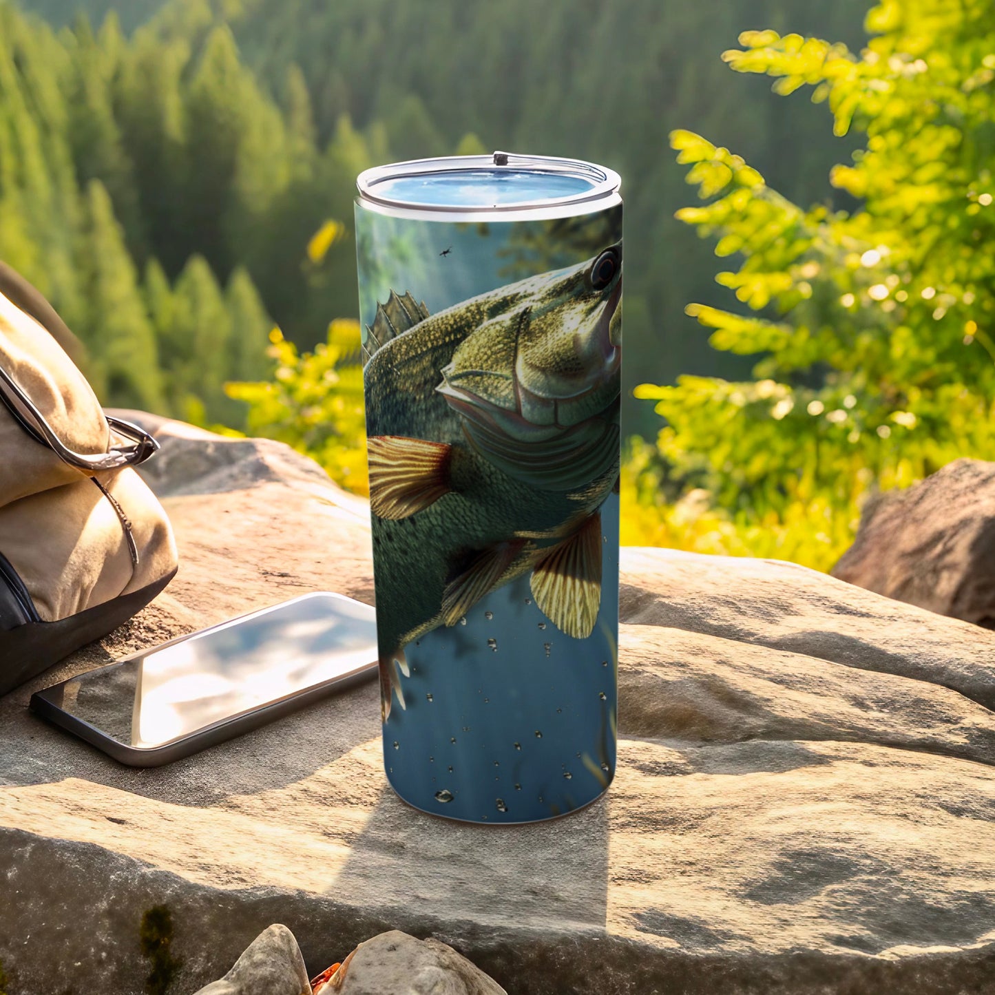 Fish design on a tall tumbler with a natural outdoor background.