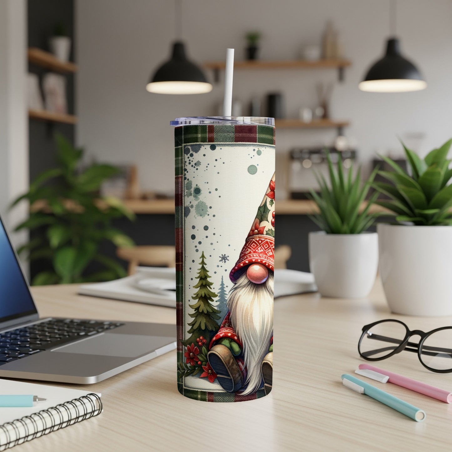Christmas gnome and trees pattern on a white tumbler with a straw.