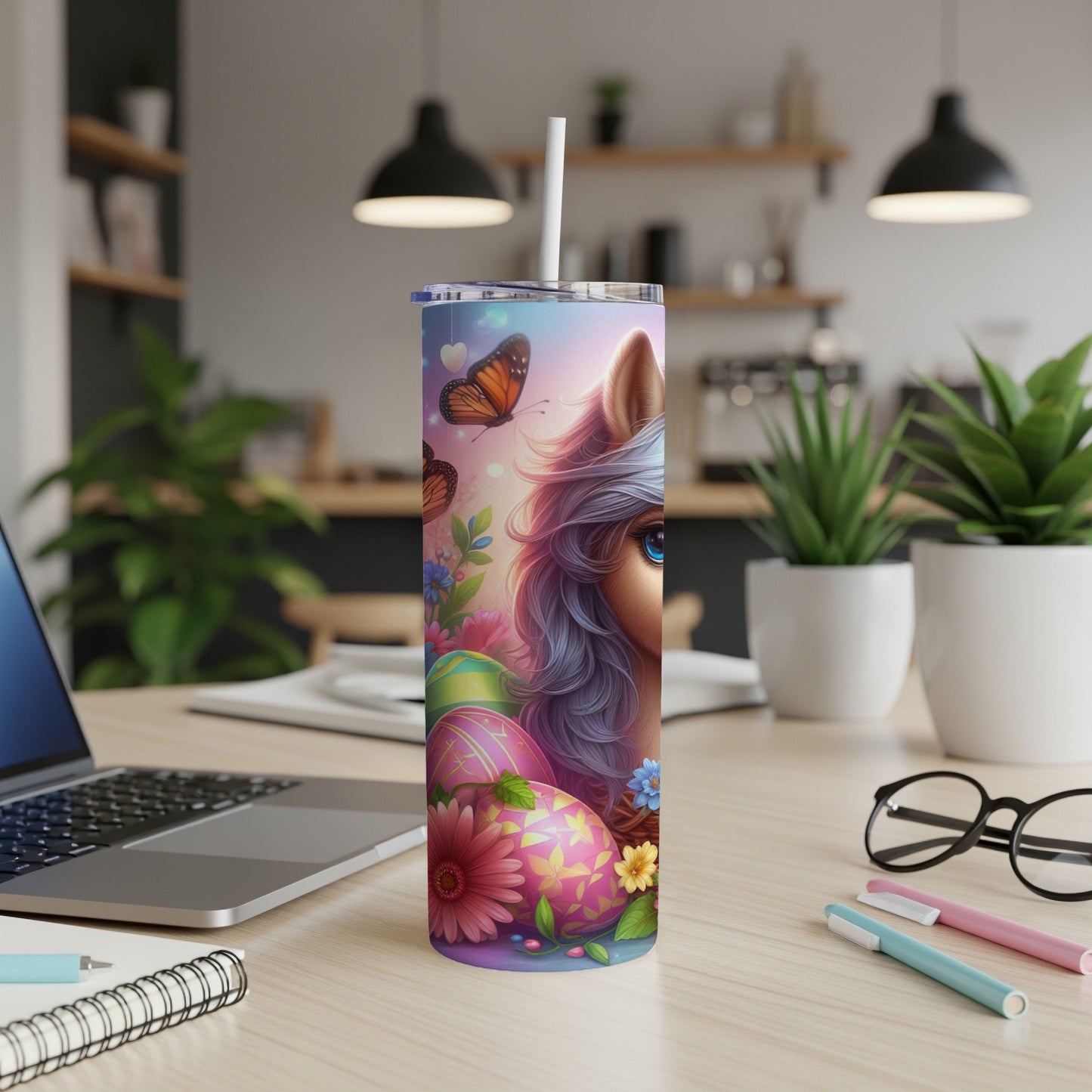 Easter tumbler with a unicorn, butterflies, and colorful eggs.