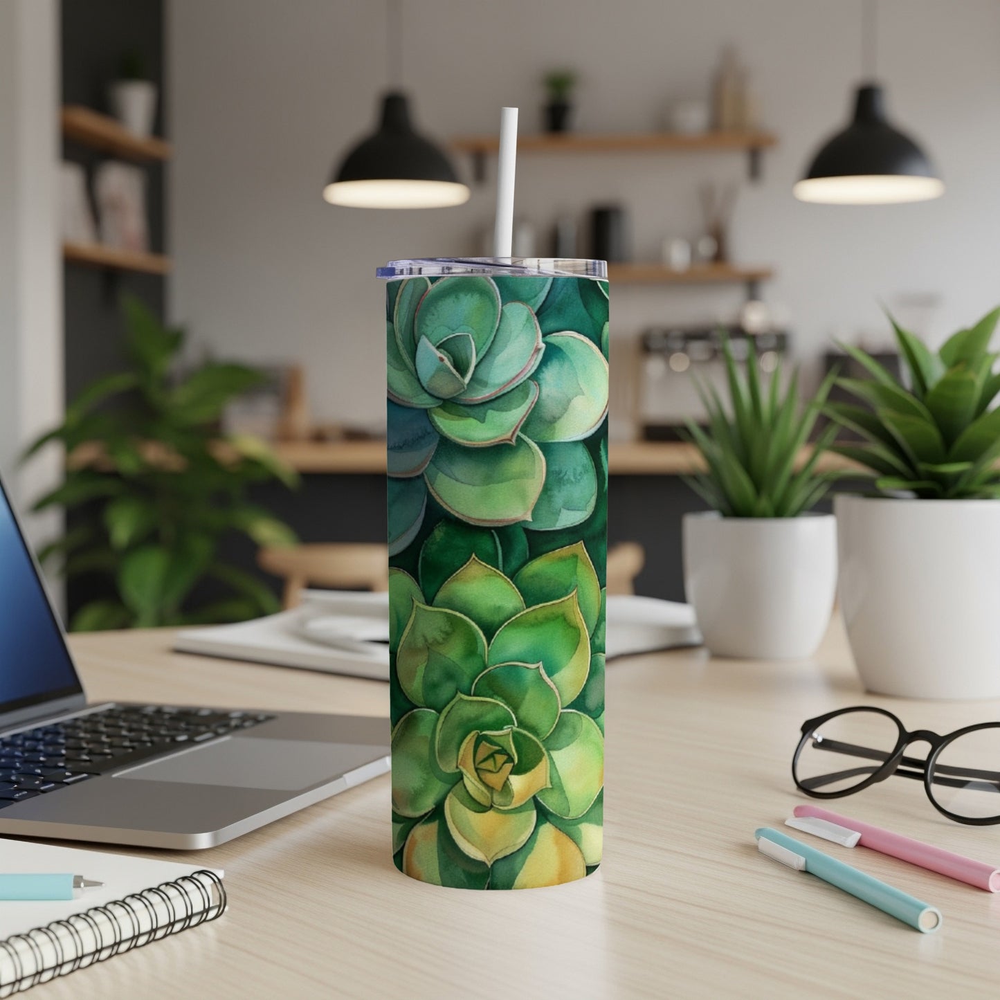 Green watercolor succulents on a white tumbler with a straw.