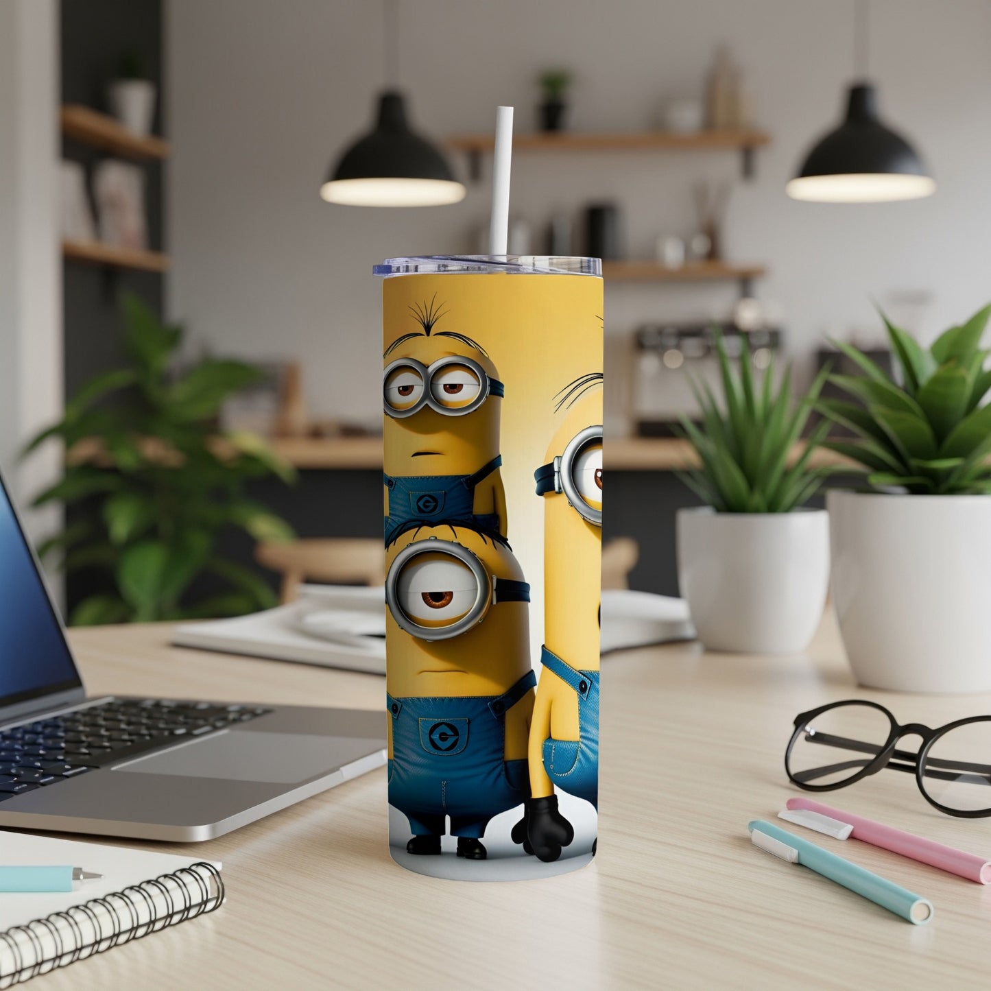 Yellow tumbler featuring three Minions characters in denim overalls.