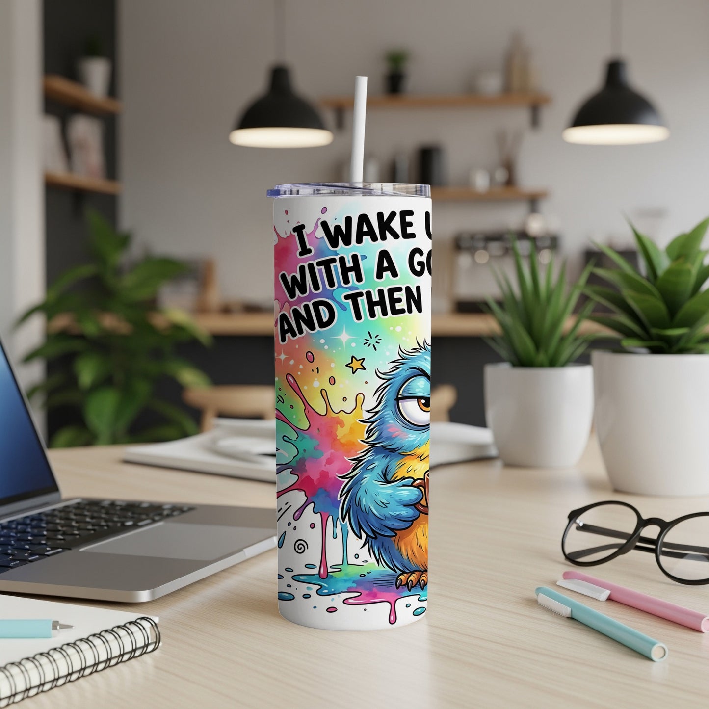 Blue cartoon bird on a tumbler with text "I WAKE UP WITH A GOAL AND THEN".