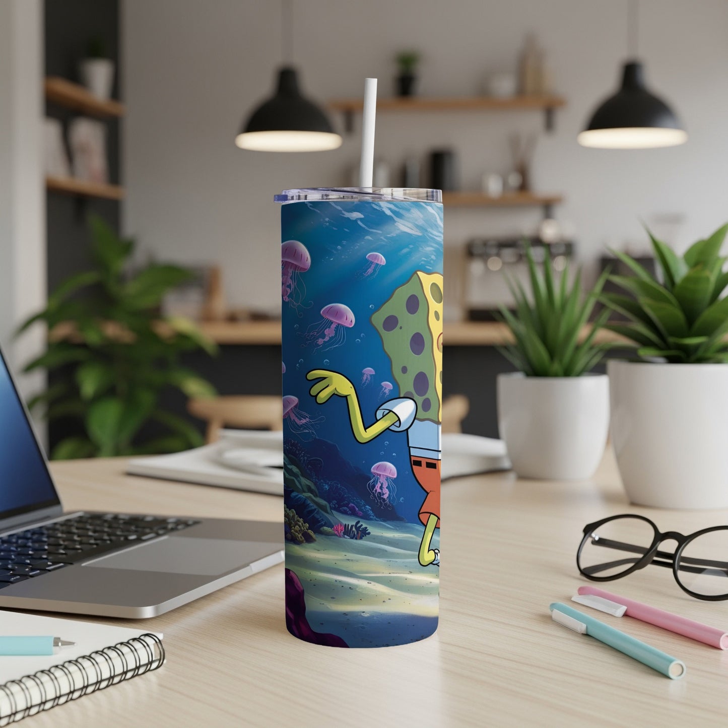 SpongeBob SquarePants character on a blue tumbler with underwater scene.