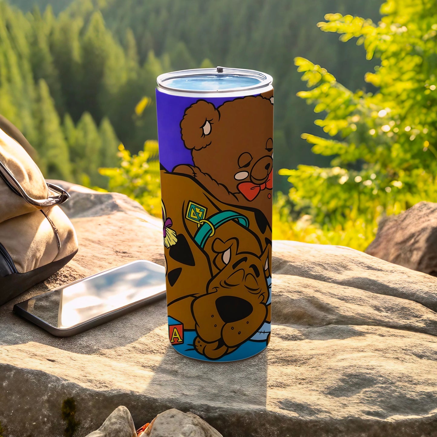 Scooby-Doo and a teddy bear on a blue tumbler.