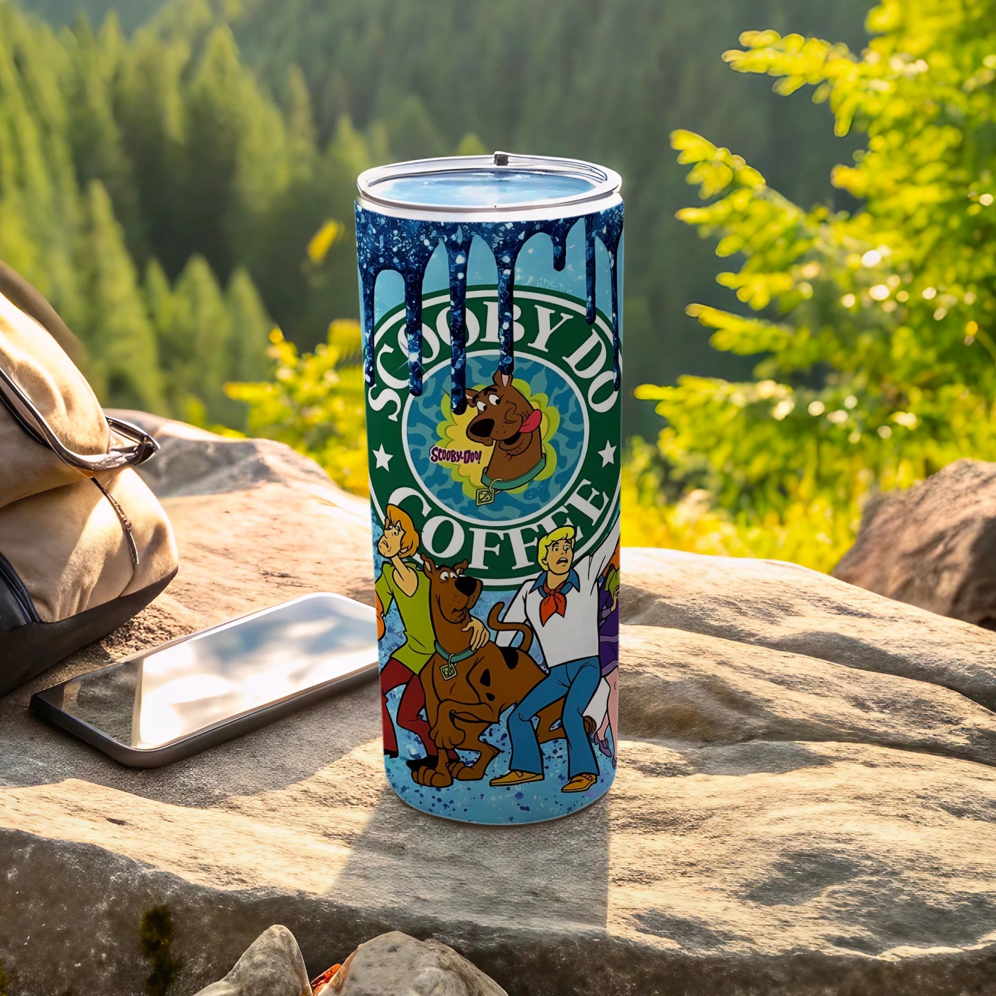 Scooby-Doo gang on a blue tumbler with dripping "Scooby Coffee" text.