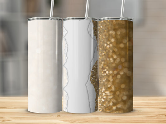 Three glitter tumblers with a torn paper effect on a wooden surface.
