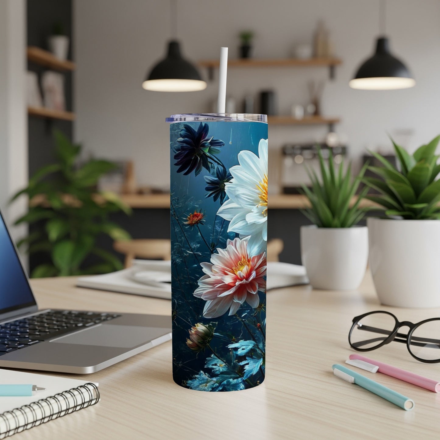 Tall tumbler with dark blue background and vibrant white and coral floral design.