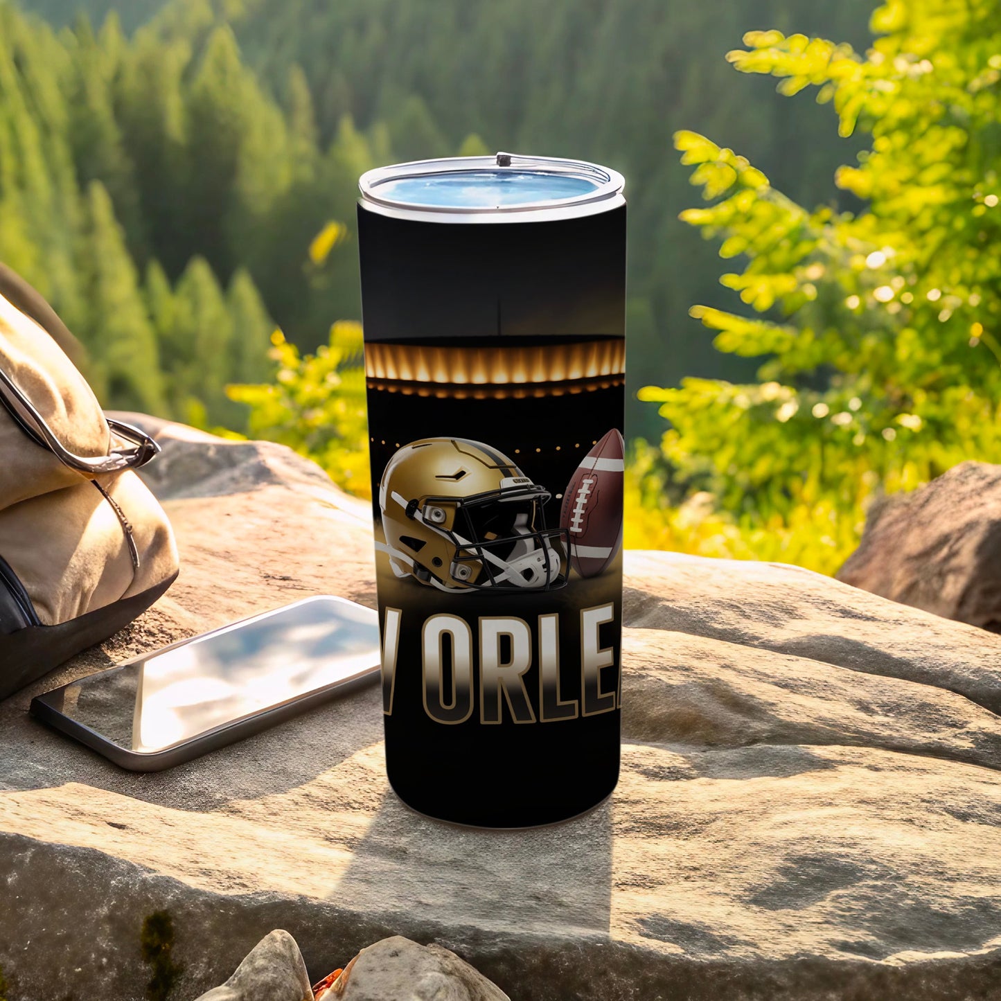 Black tumbler with gold football helmet, football, and "NEW ORLEANS" text.