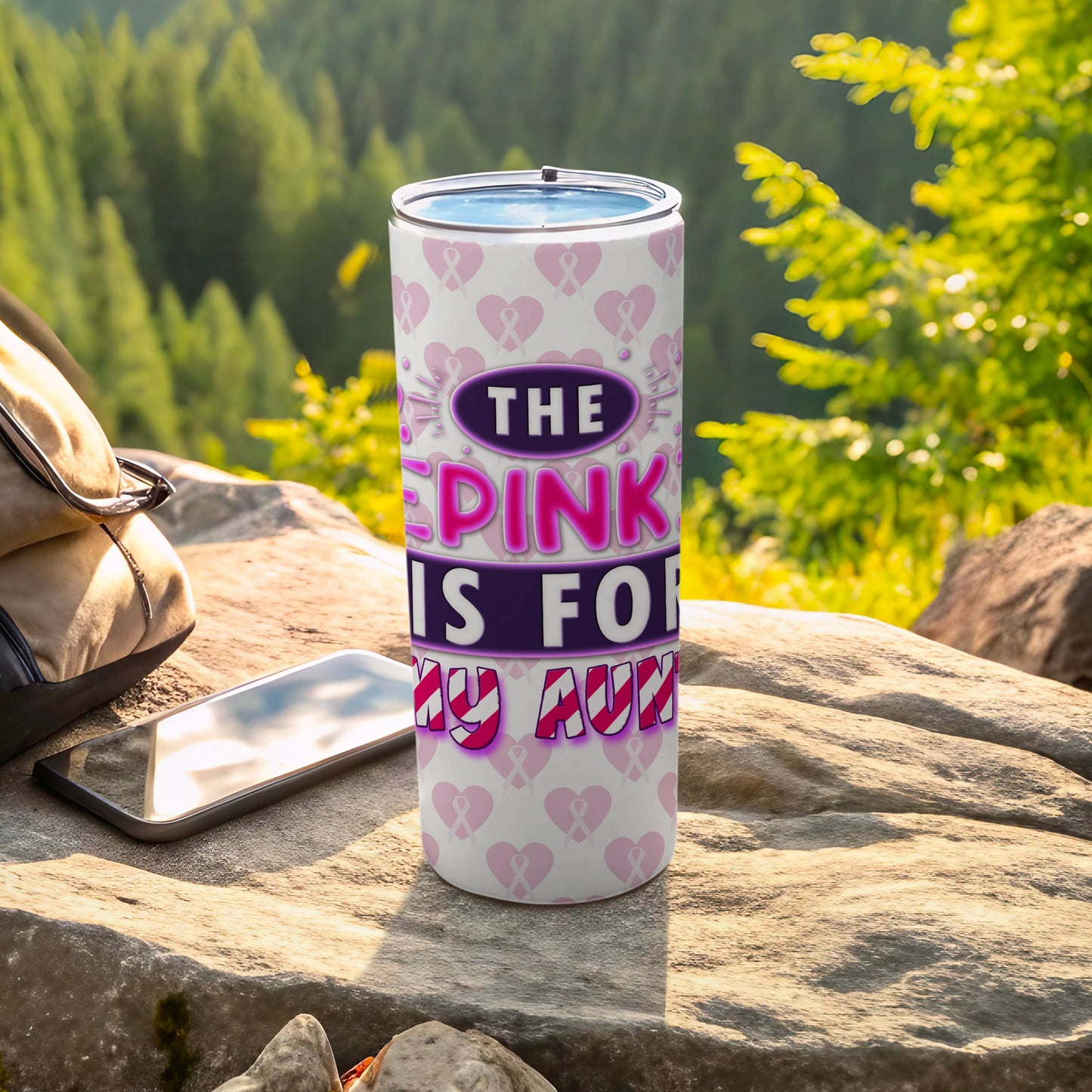 Pink tumbler with "The Pink is for my Aunt" text and ribbon designs.