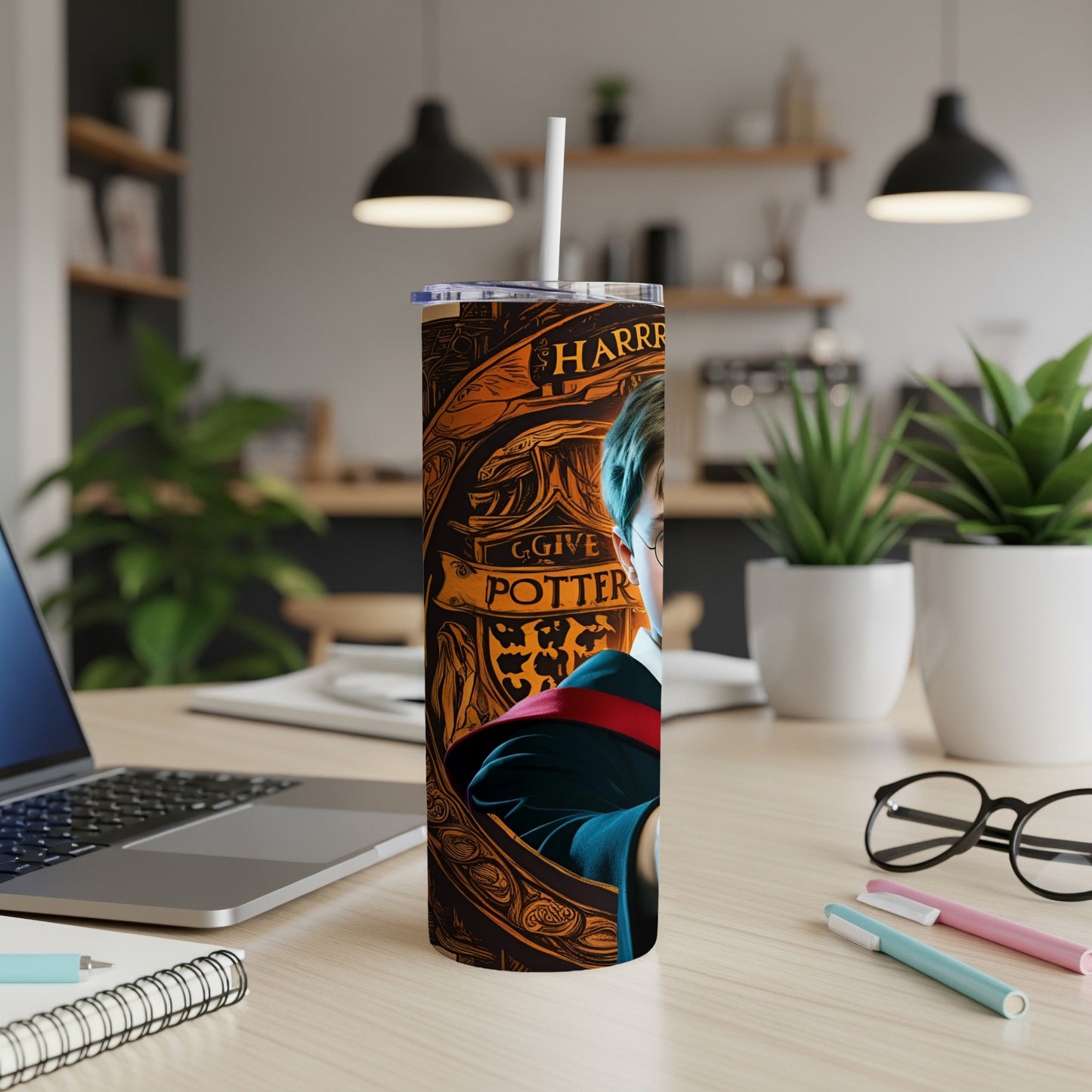 Harry Potter tumbler with gold scrollwork and character portrait.