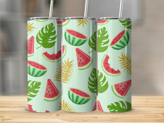 Green tumbler with watermelon slices and gold palm leaves.