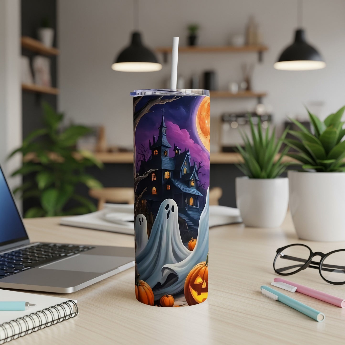 Tumbler with Halloween ghosts, haunted house, pumpkins, and full moon design.