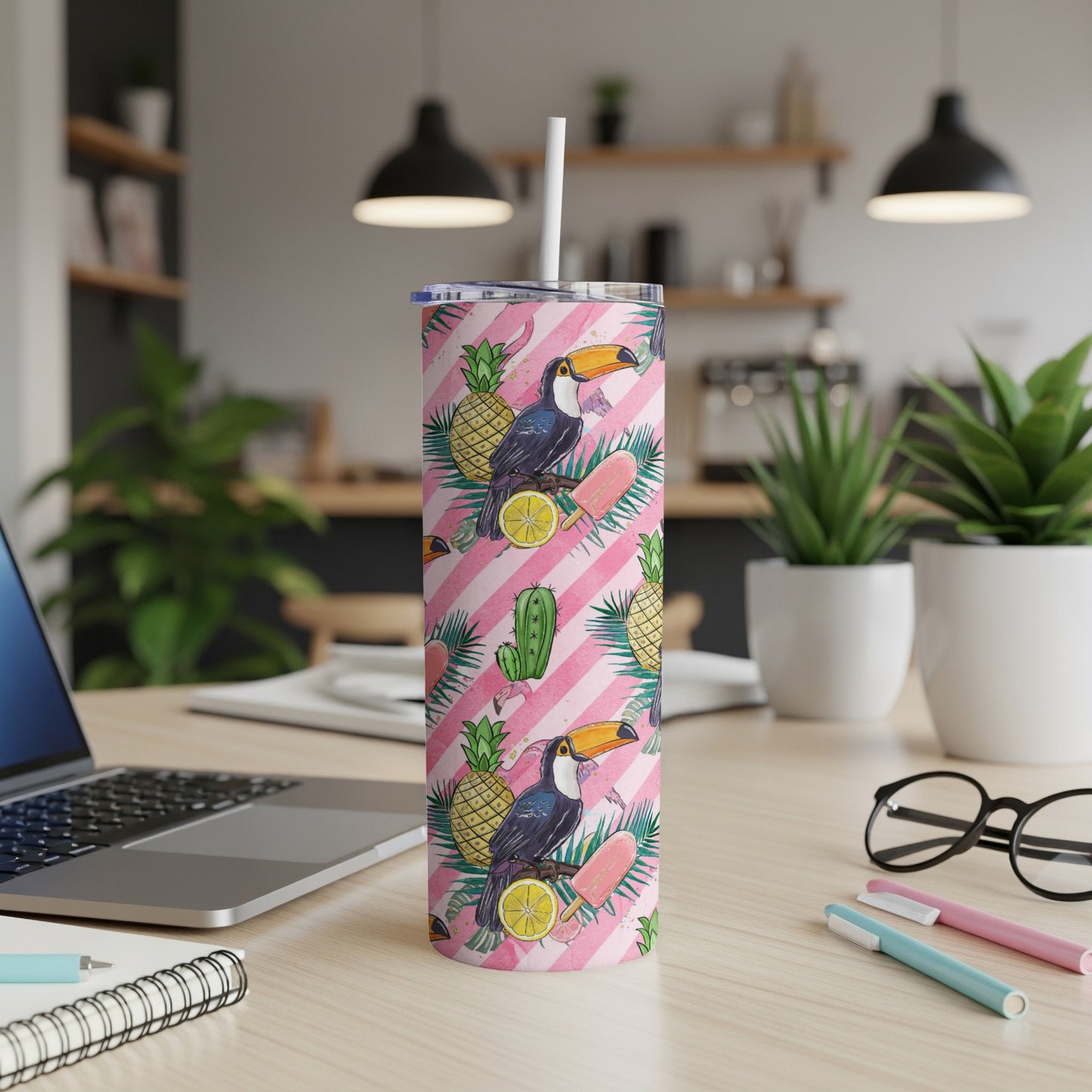 Toucan and flamingo patterned tumbler with popsicle and pineapple accents.